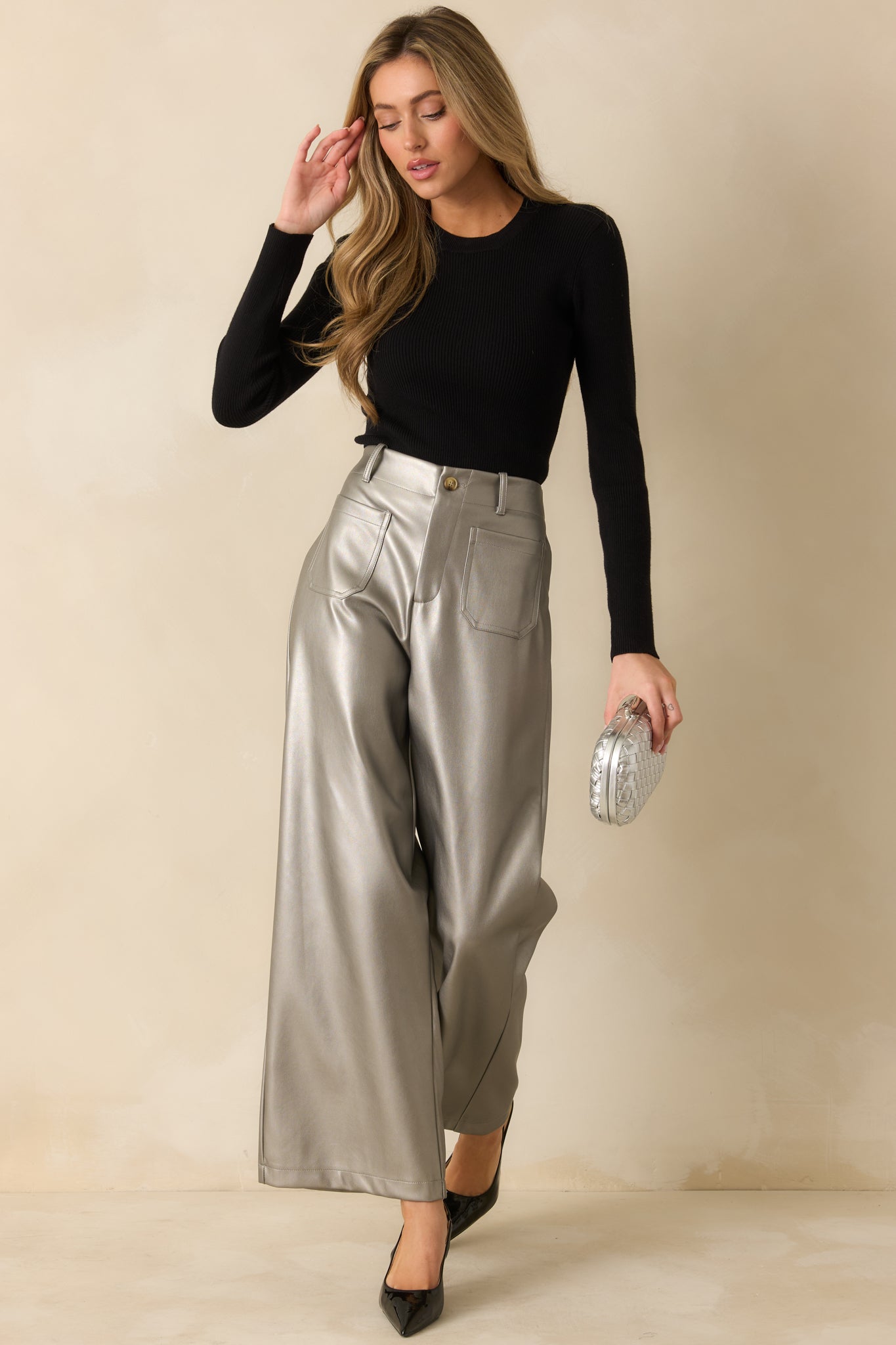 Grey metallic pants styled with a modern wide leg cut and subtle utility-inspired pocket detailing.