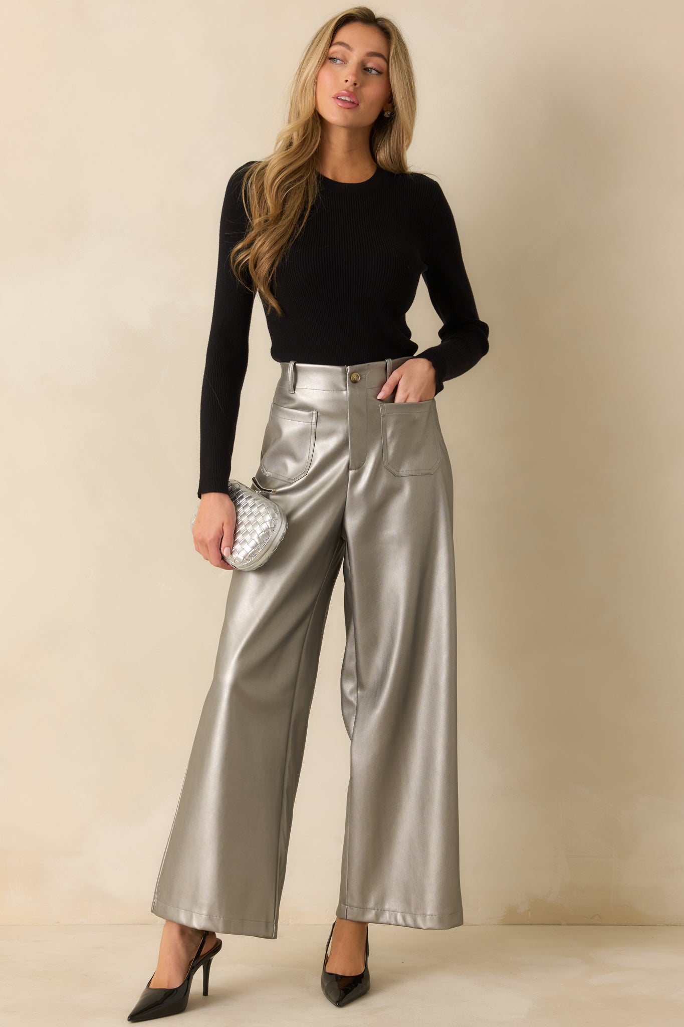 Grey metallic wide leg pants with front patch pockets and belt loops giving a modern utilitarian edge.
