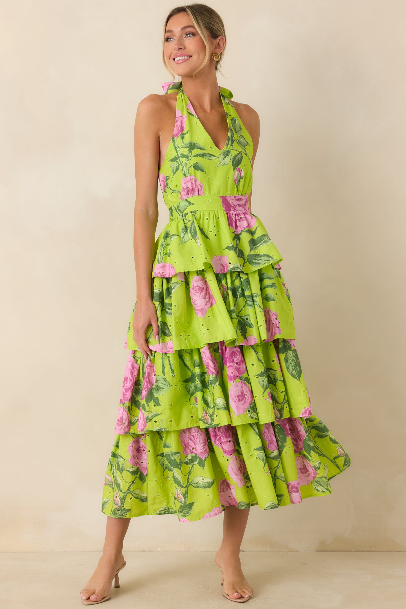 Lightweight cotton dress designed with a self-tie halter neckline and flowing fit-and-flare shape.