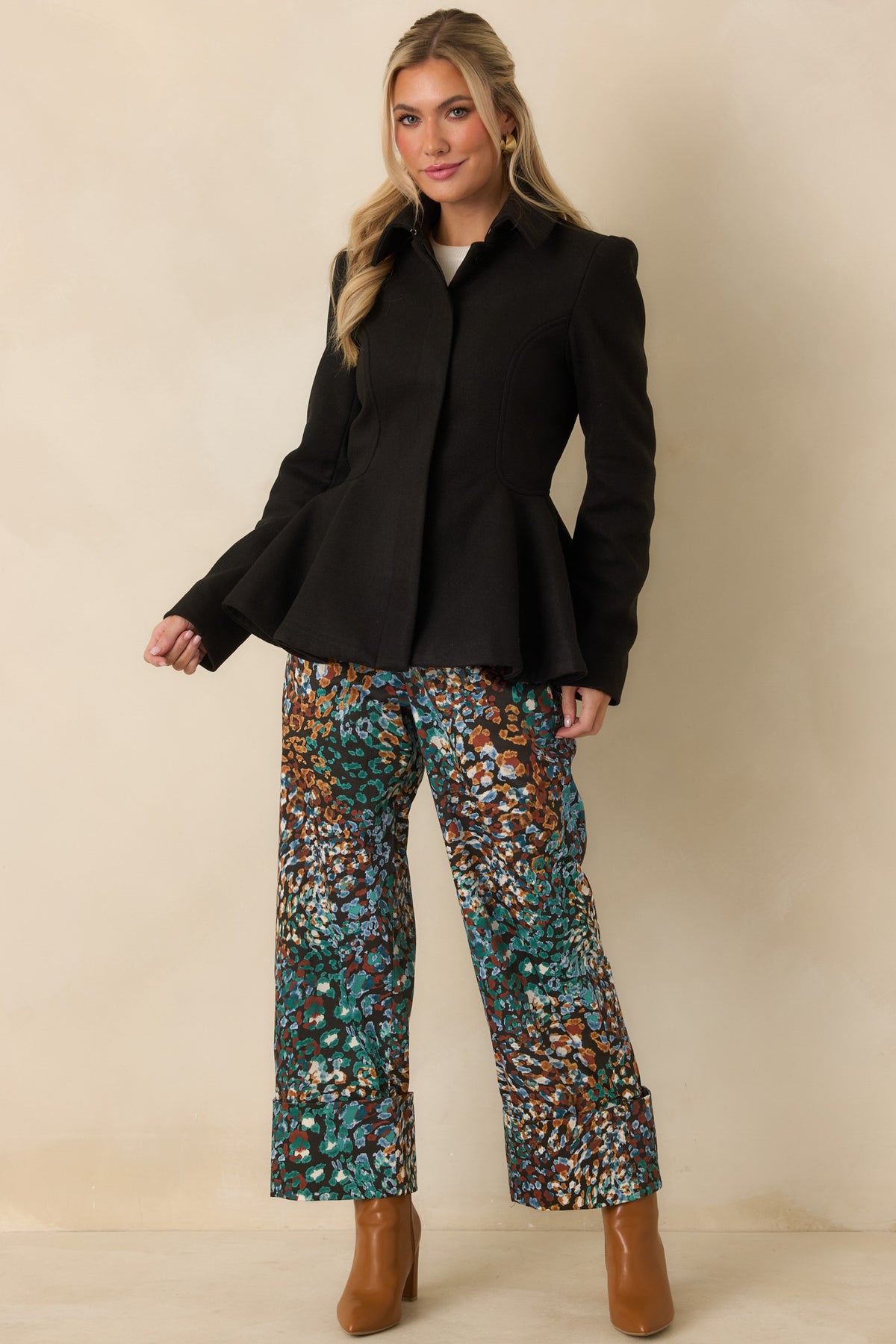 High-rise printed pants with a cropped straight-leg silhouette and wide turned-up cuffs.