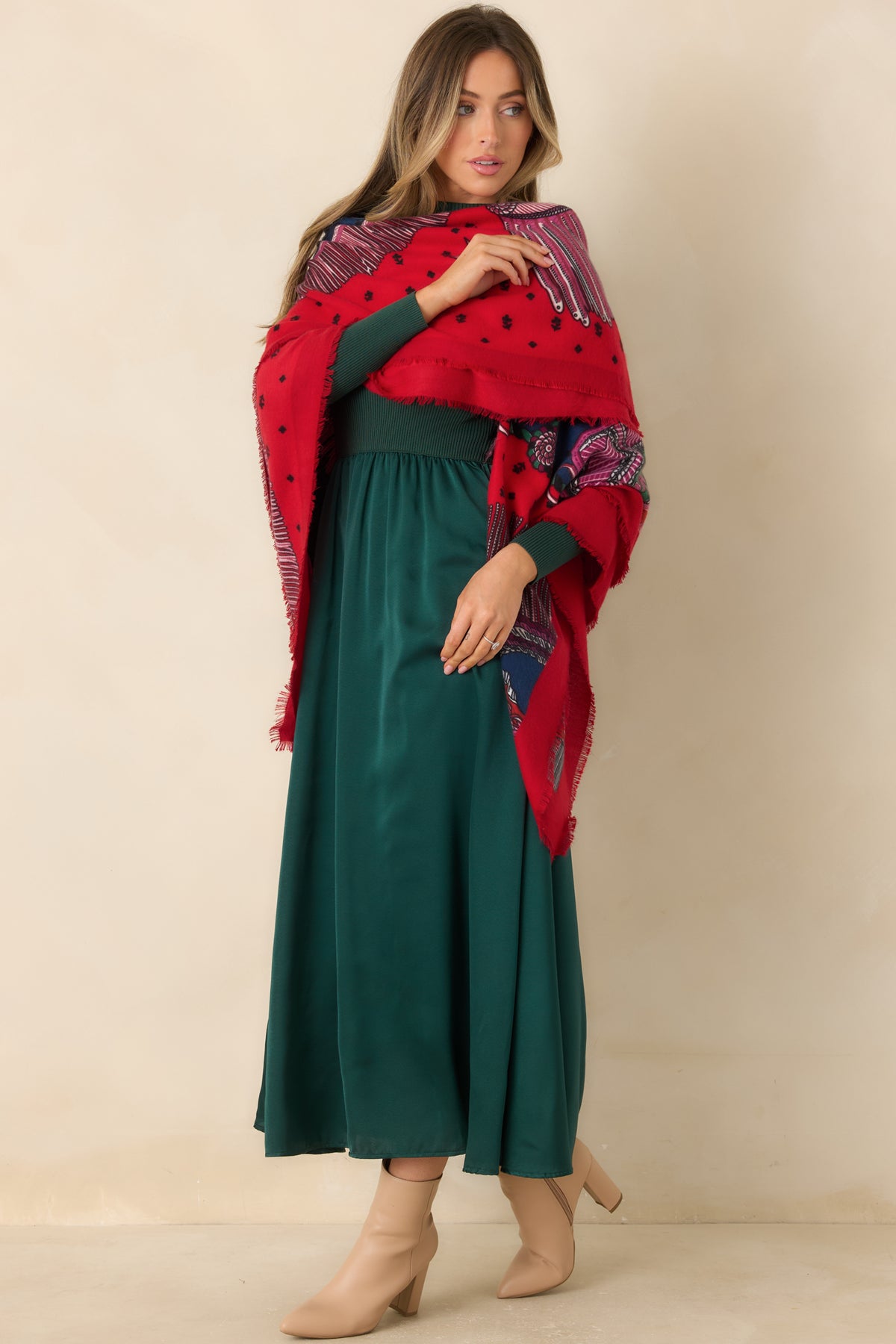 Ribbed knit and smooth satin combine in this hunter green dress with a defined waist and flared skirt.