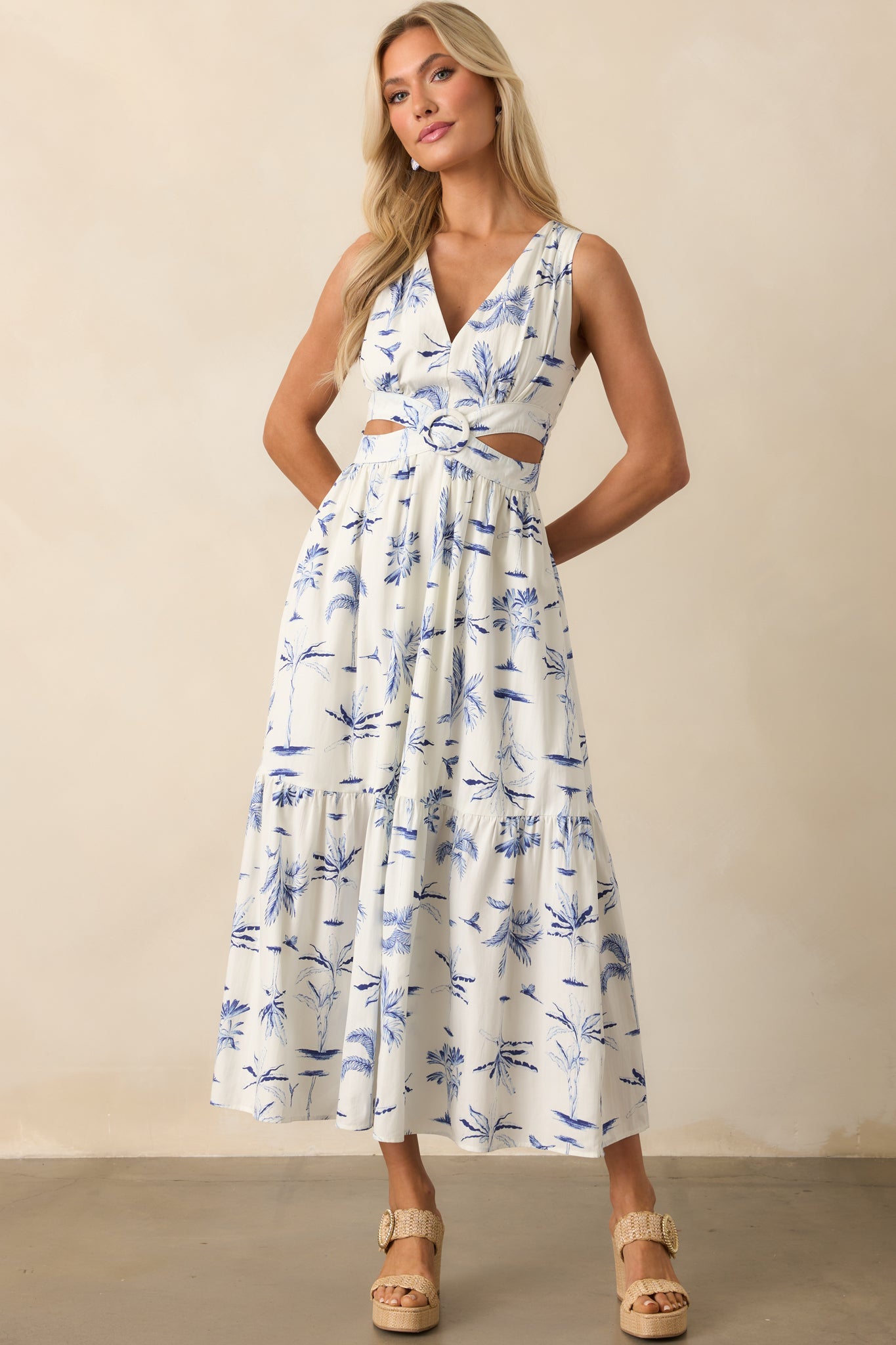 Frontal image capturing the relaxed fit and intricate print of the maxi dress with tiered skirt layers.