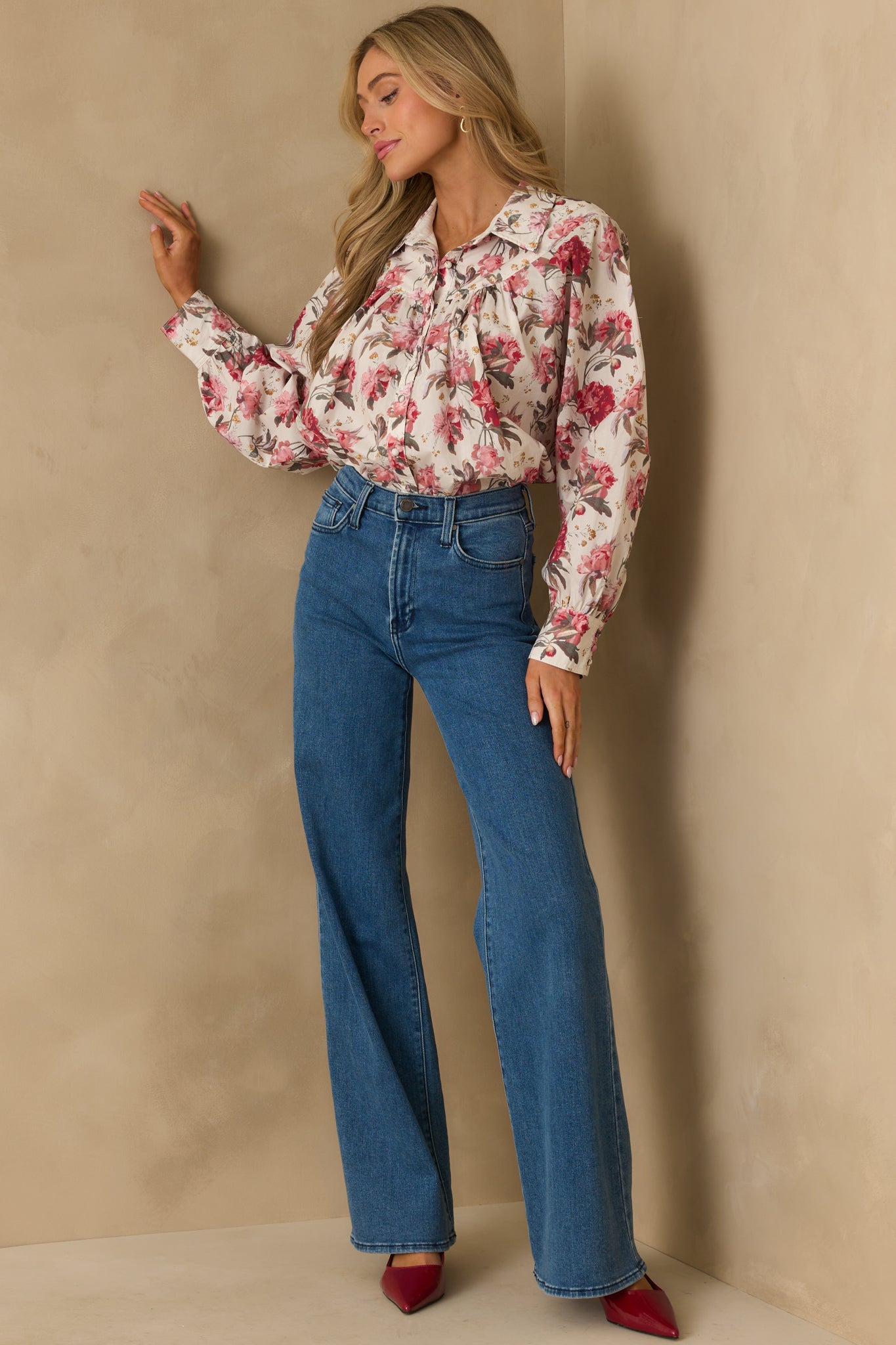 Full body image focusing on the collared neckline and relaxed fit design.