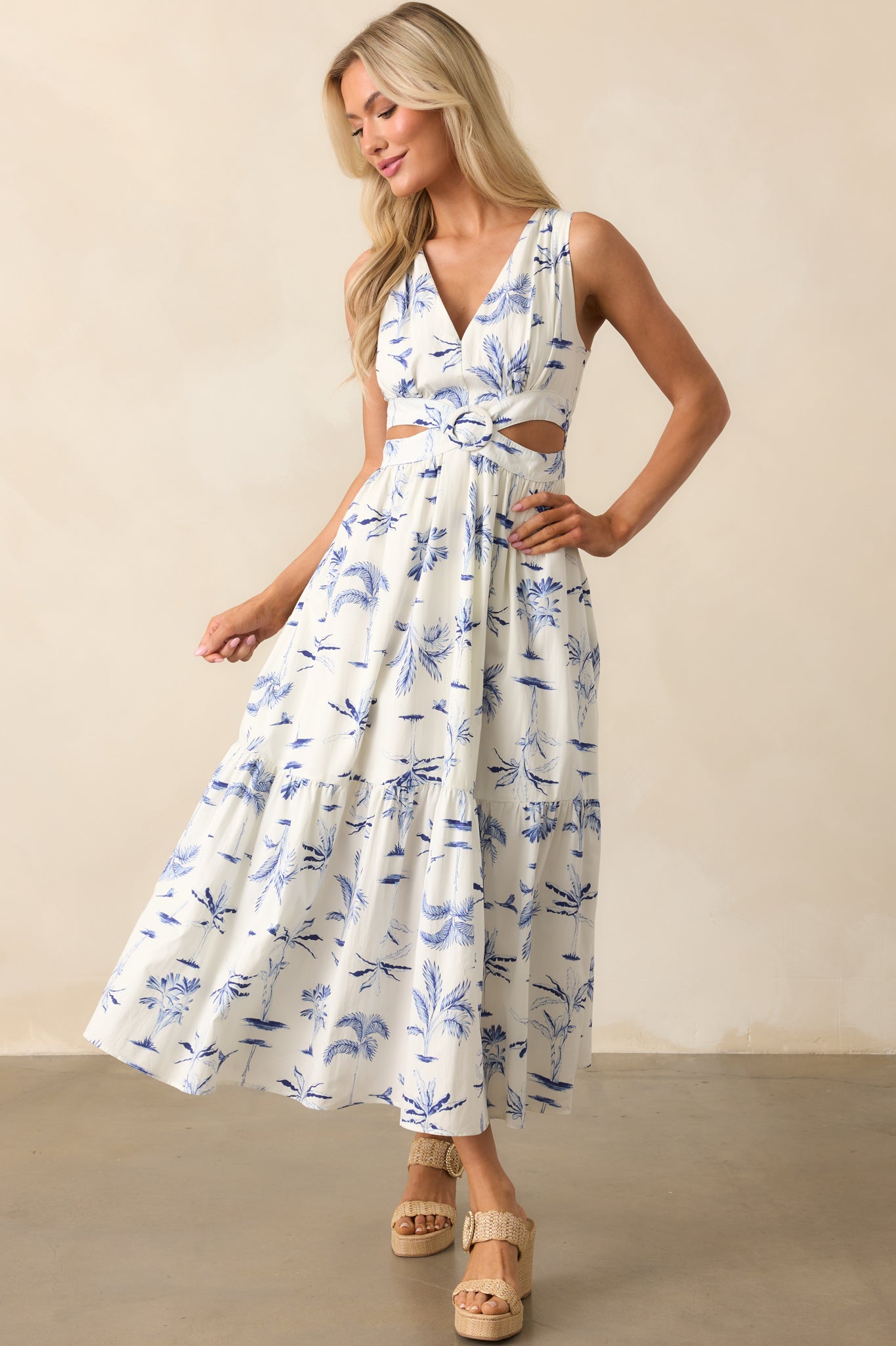 Front-facing image highlighting the sleeveless silhouette and the gentle drape of the maxi dress fabric.
