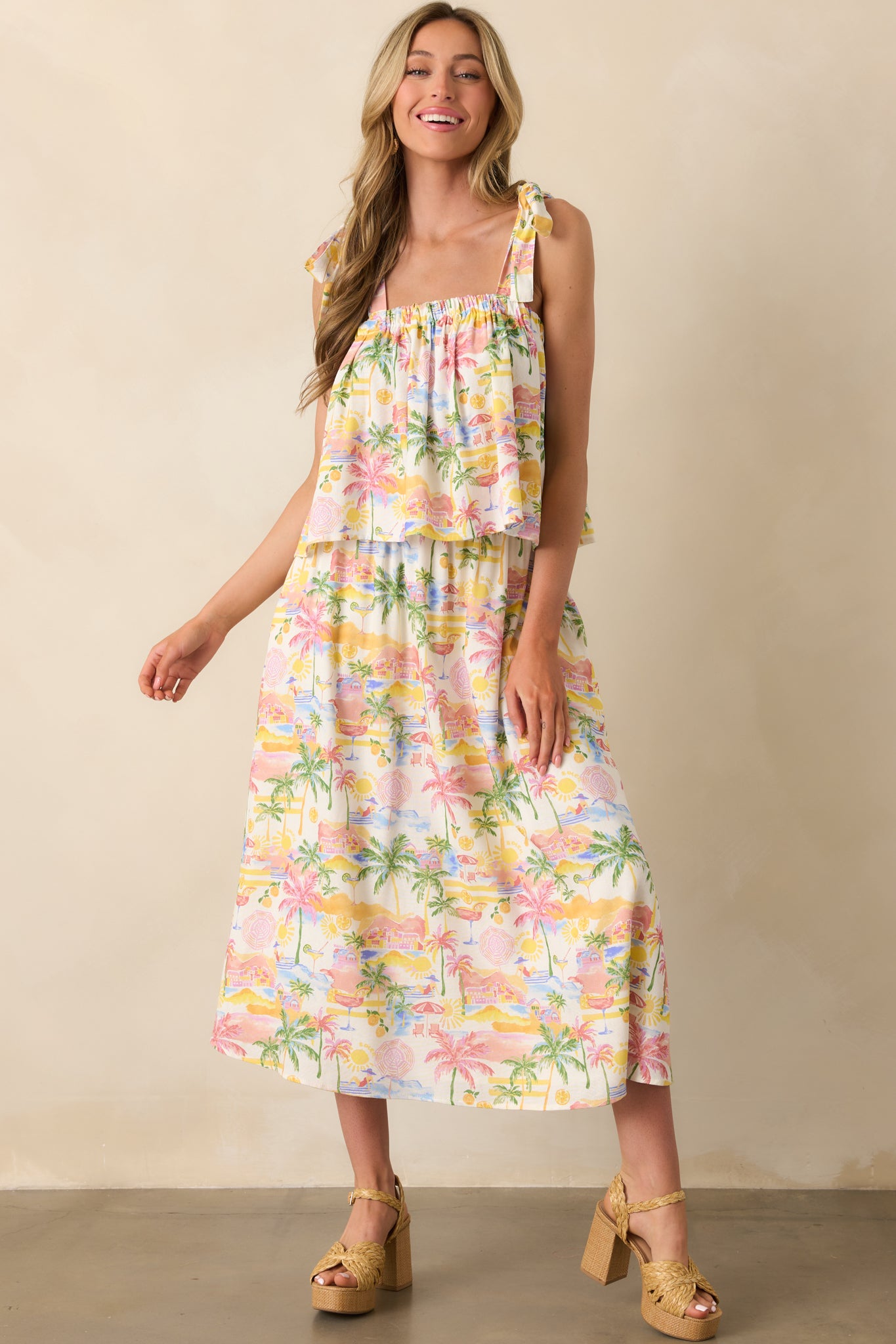 Full length image showcasing the contrast between the ivory base and bold tropical design, with a soft, breezy silhouette.