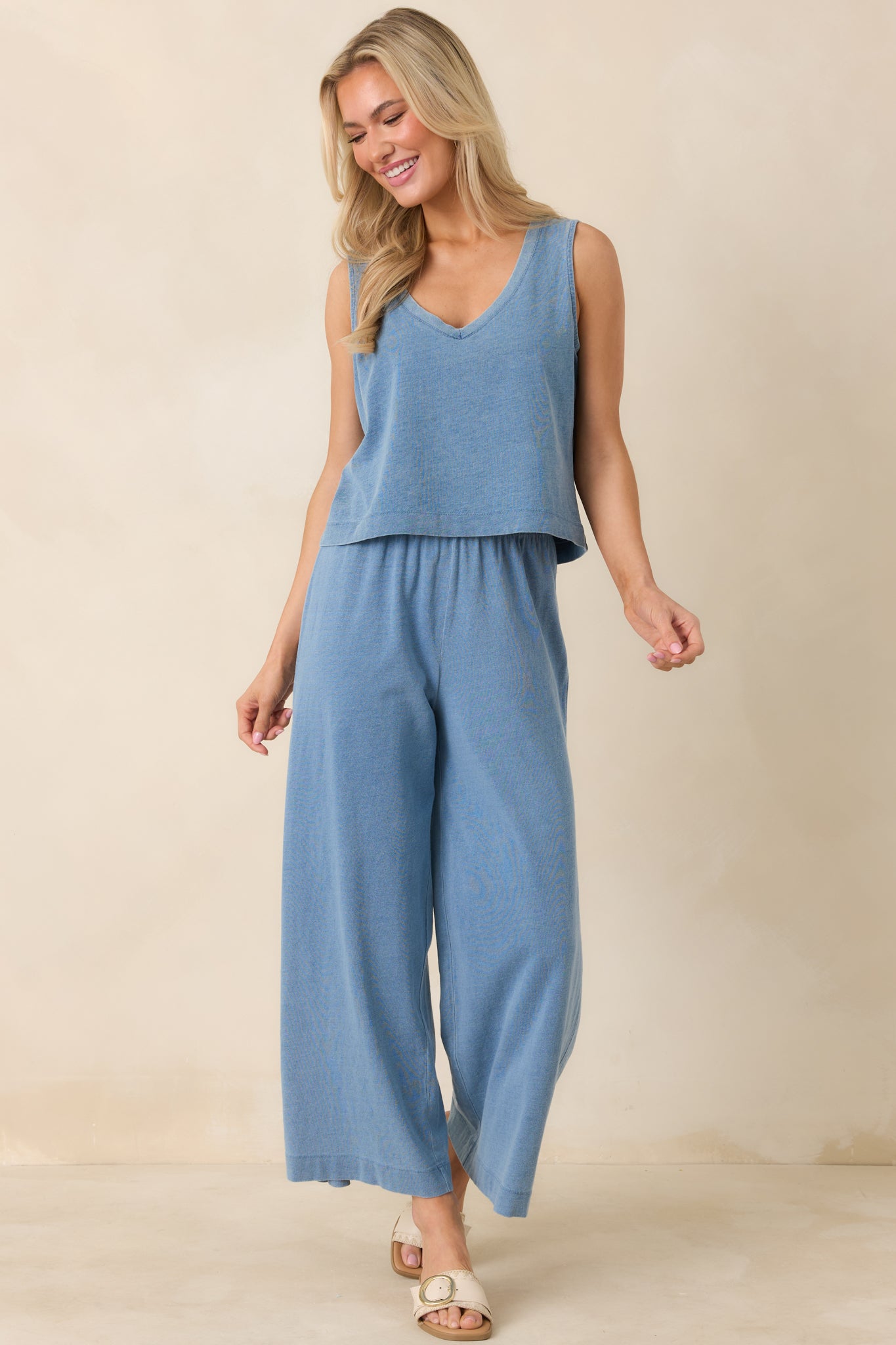 Indigo tank top with clean neckline binding and easy drape.