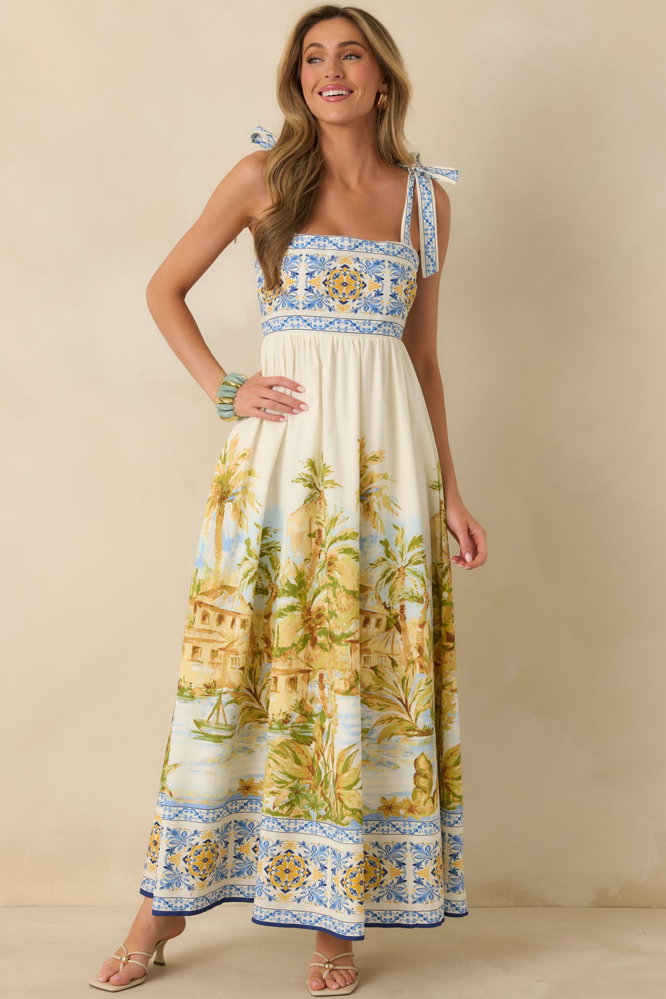 Ivory maxi dress with lightweight, breathable fabric and relaxed, easy drape.