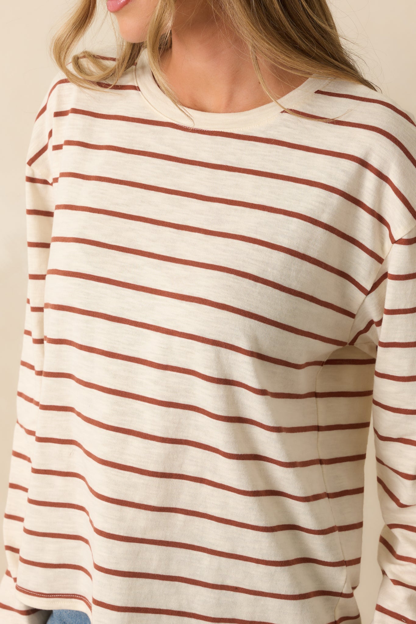 Close-up detail of the top’s fabric, showing cinnamon brown horizontal stripes and soft cotton blend texture.