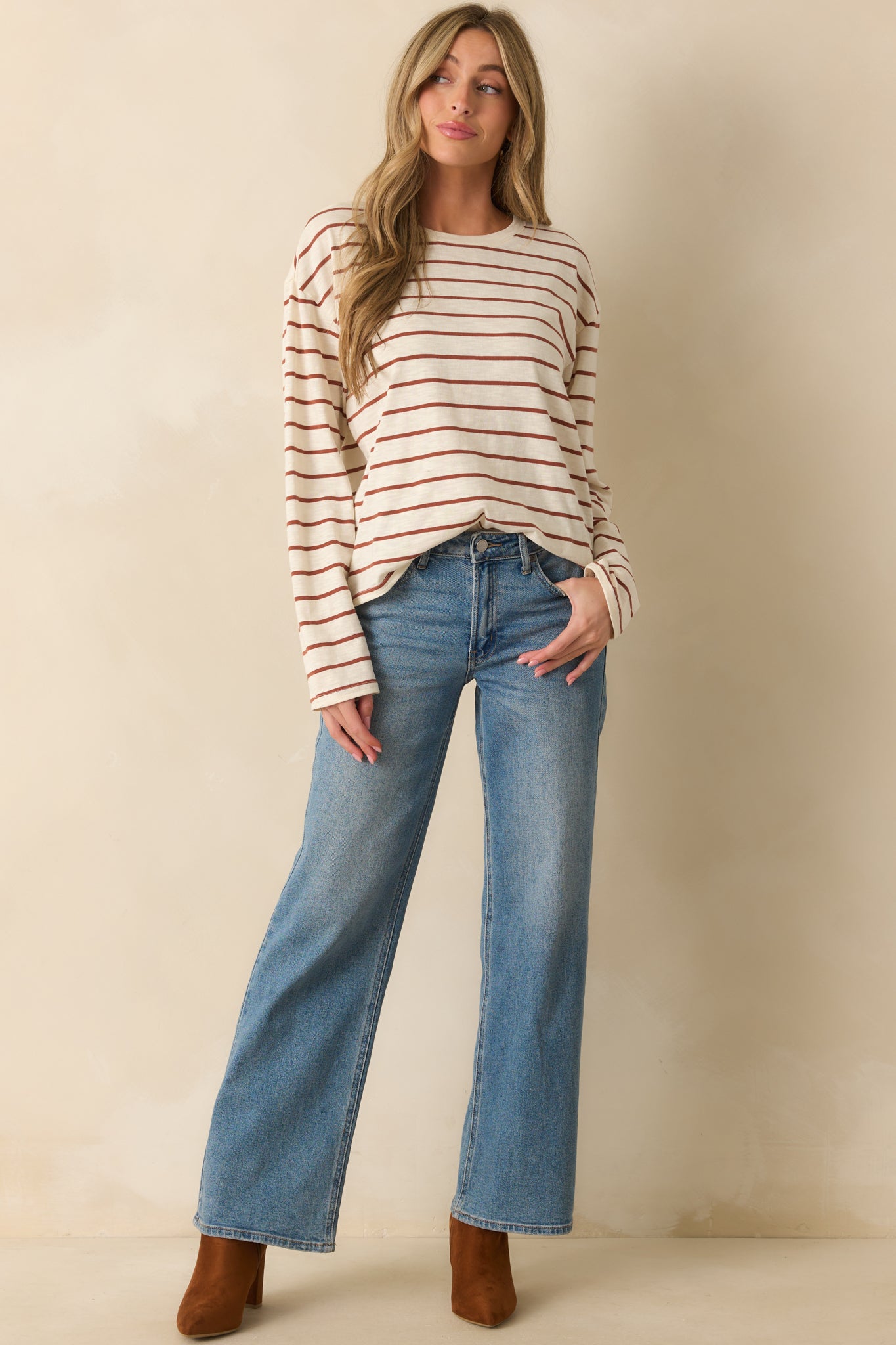 Front-facing full body image of a lightweight cotton blend top featuring cinnamon stripes across an ivory base and a crew neckline.