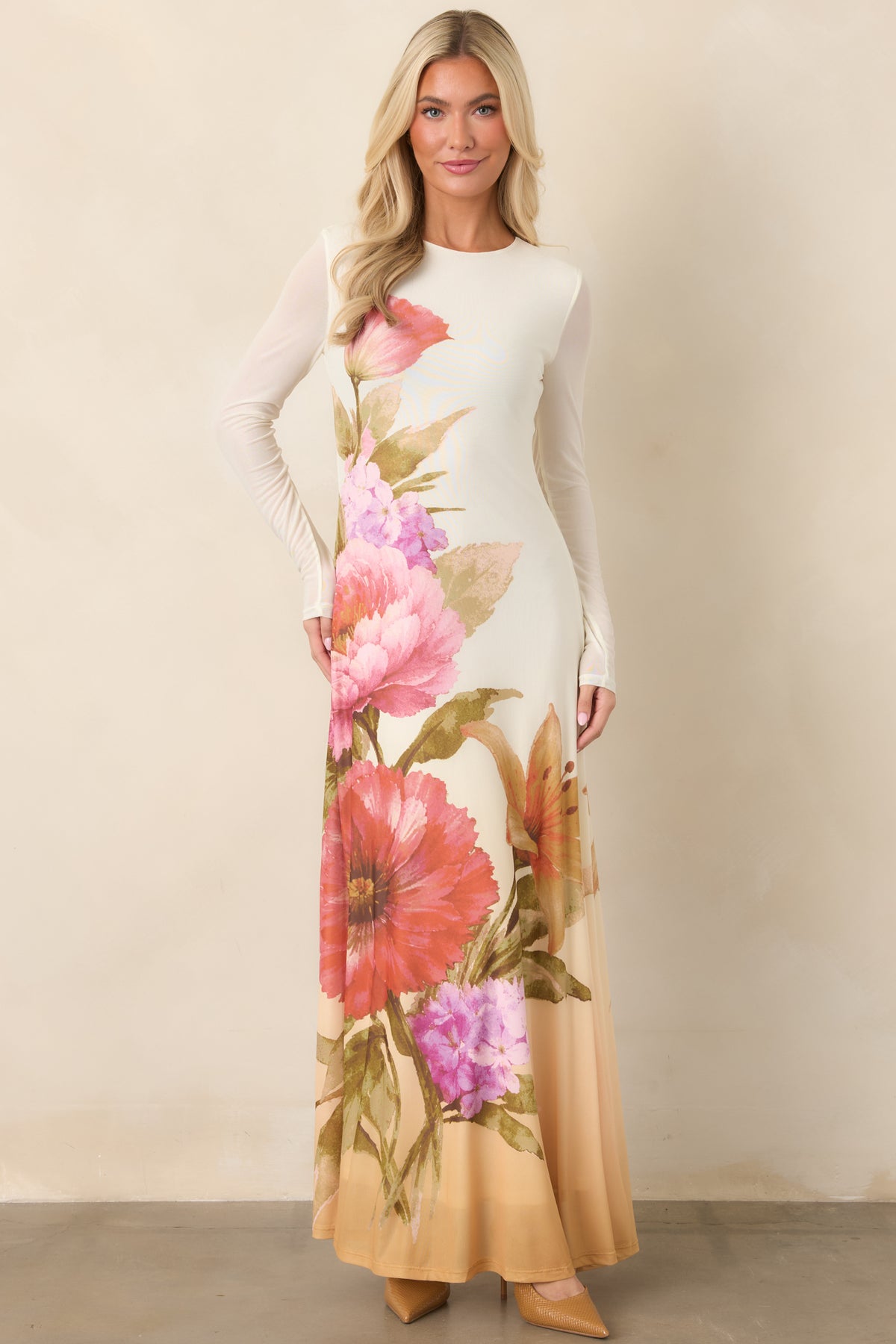 Ivory maxi dress featuring a vivid watercolor floral print.