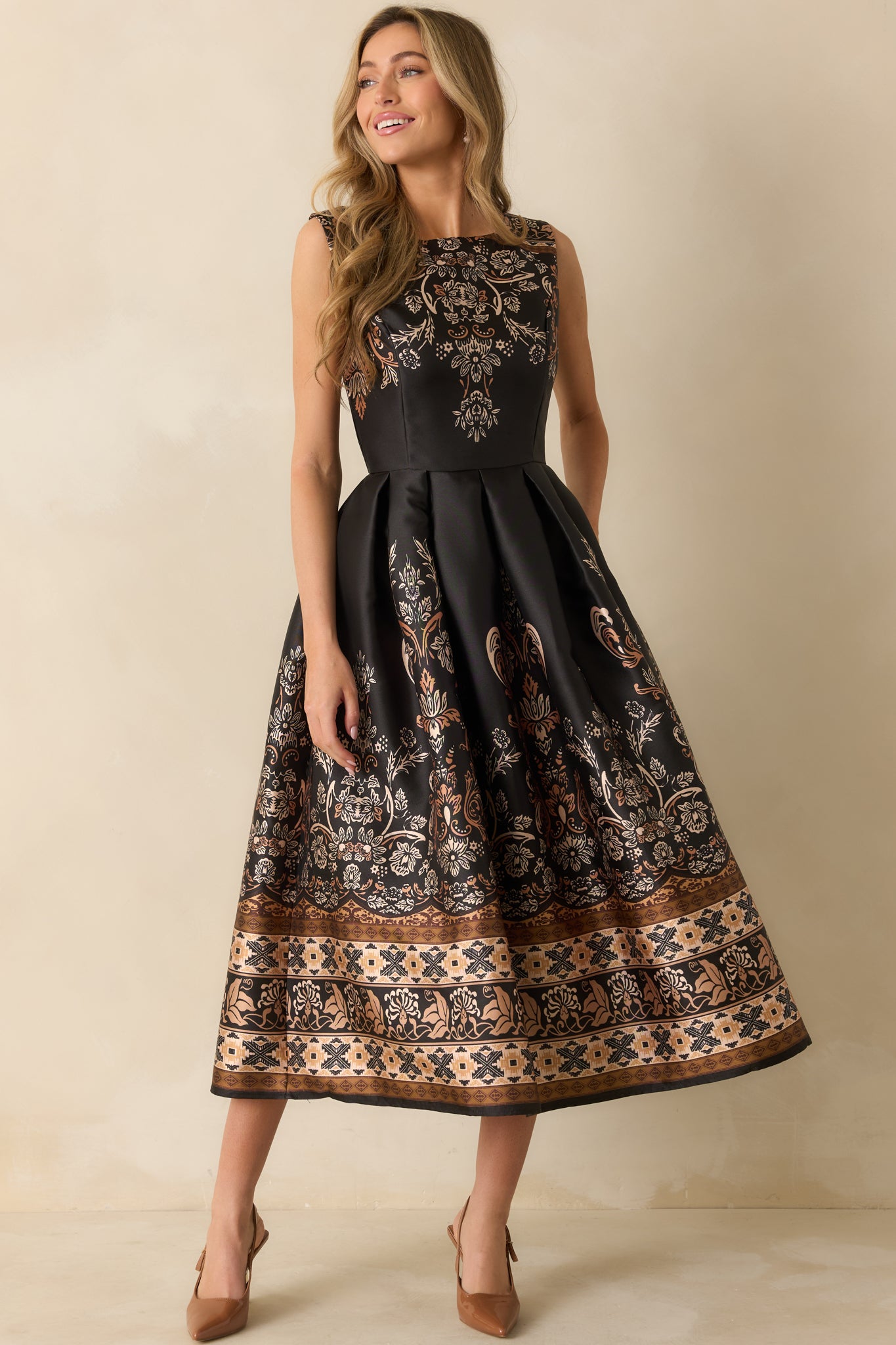 Angled front view showcasing the jacquard pattern and fitted bodice of the maxi dress.