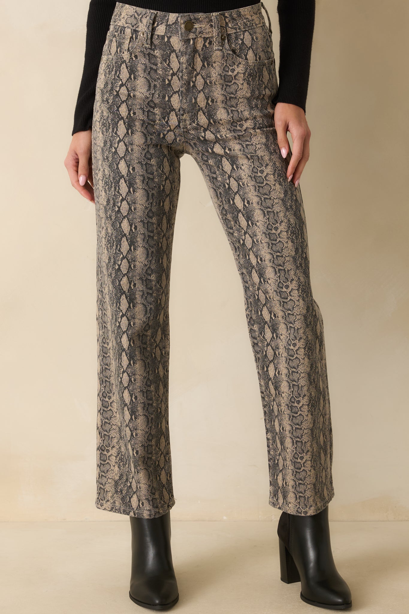 Front section of the jeans showcasing the patch pockets and buttoned zip fly.