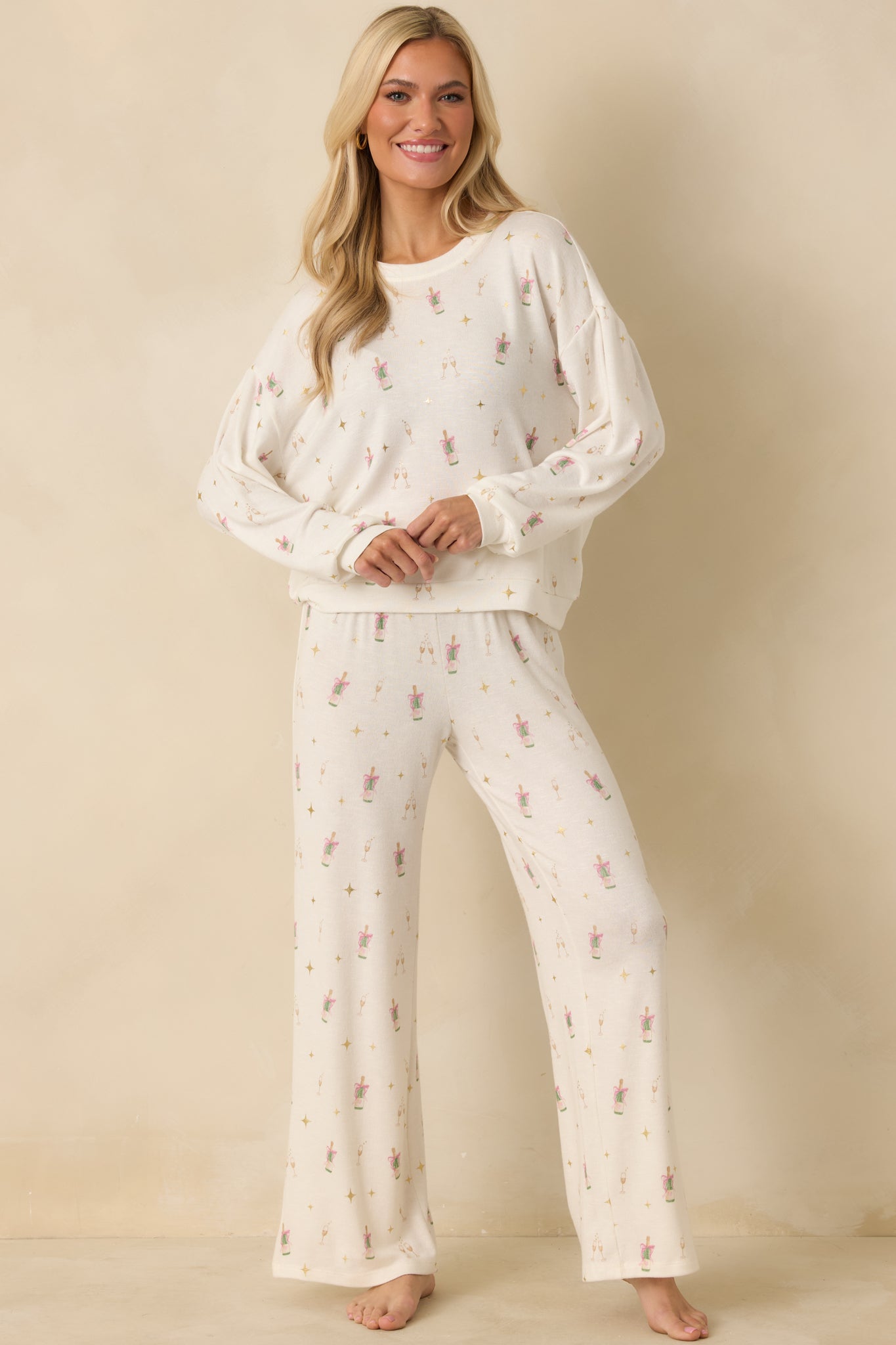 Knit pants displaying relaxed fit and lightweight, stretchy fabric texture.