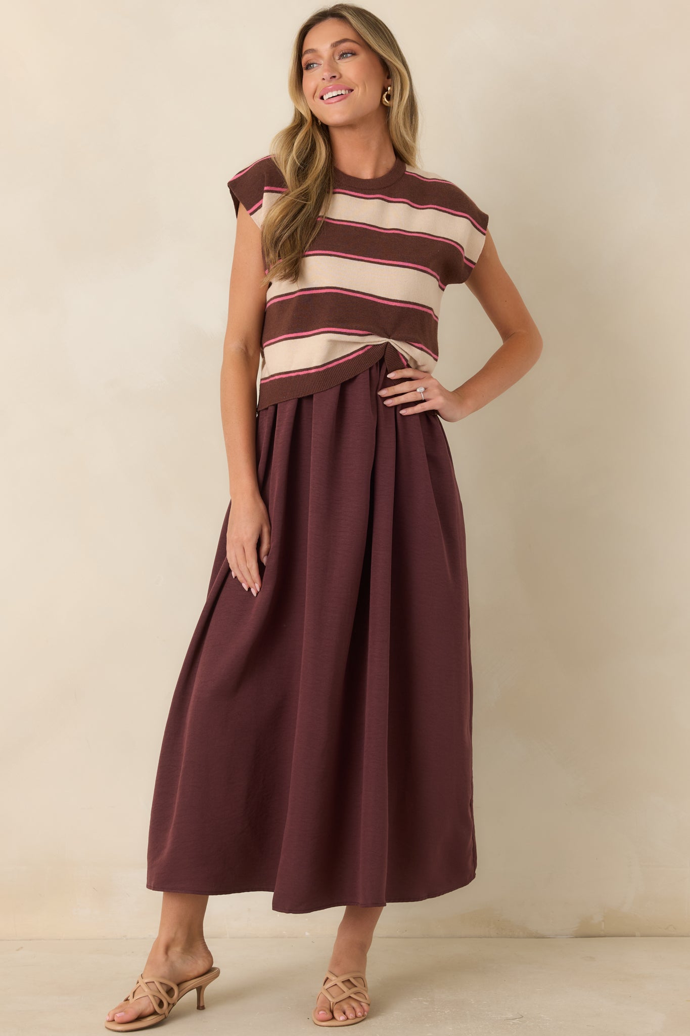 All-in-one maxi dress featuring a layered design with an attached sweater top and softly draped skirt.