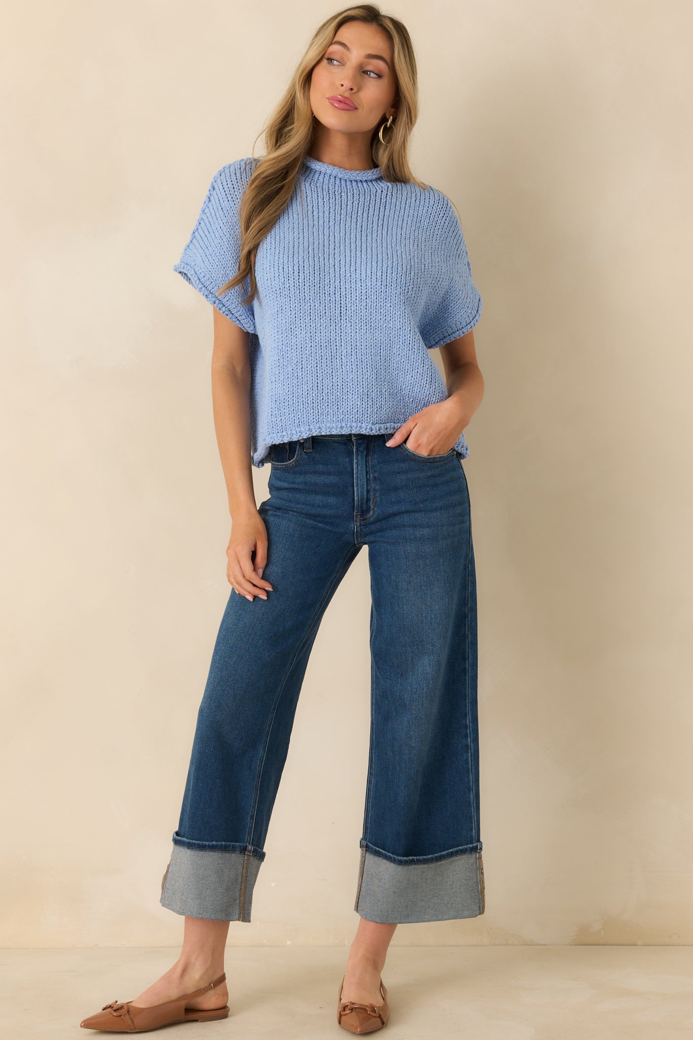 Light blue sweater, thick yarn knit, short sleeves, rolled trim neckline detail, easy everyday layering piece.