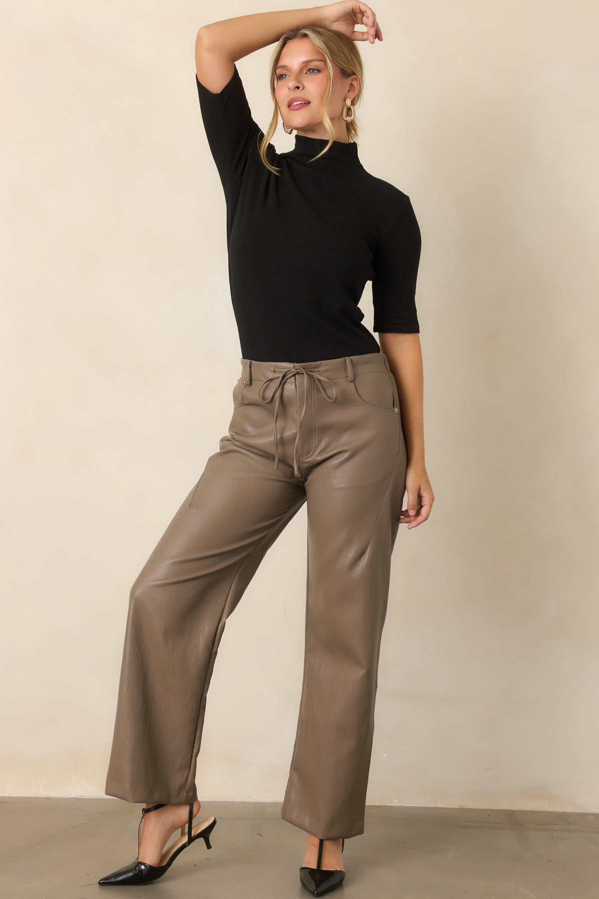 Light brown pants with a straight wide-leg cut and functional side pockets.
