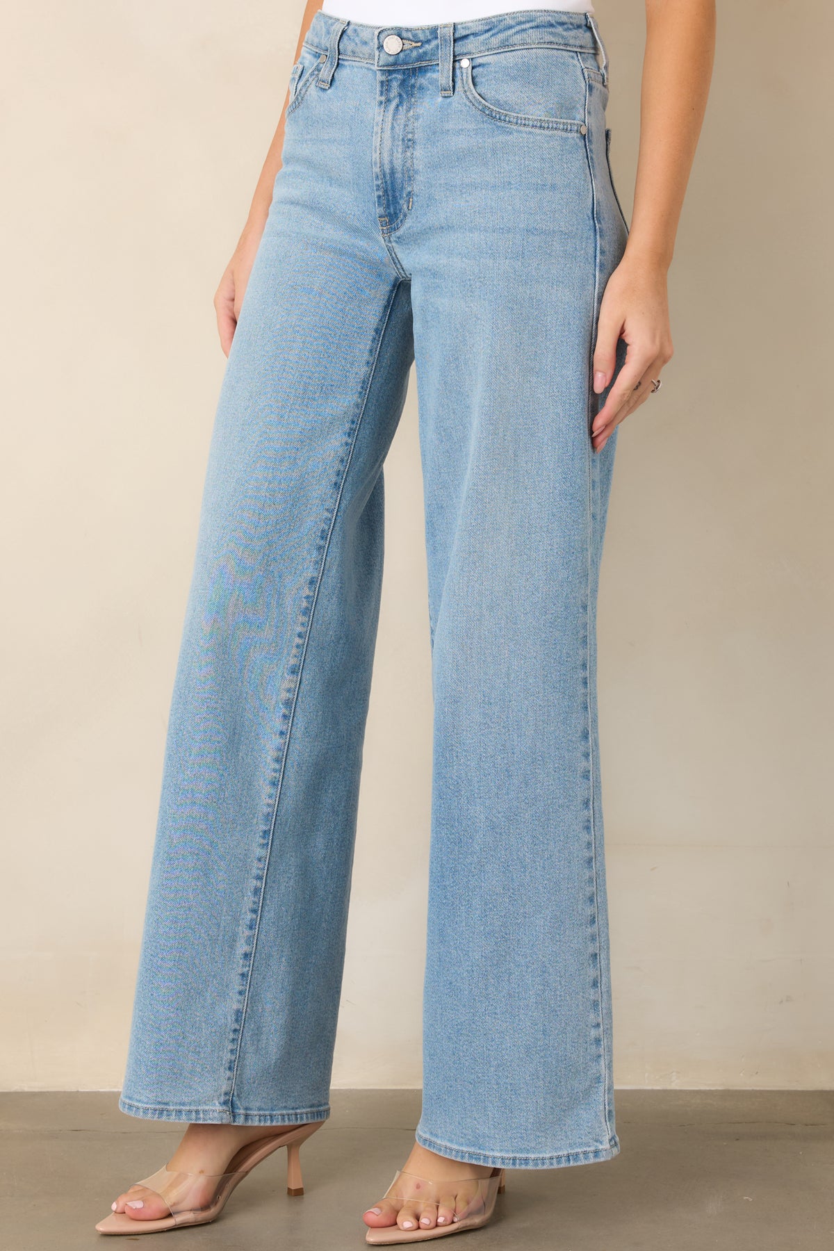Light-wash denim featuring a wide-leg silhouette designed for an easy, polished look.