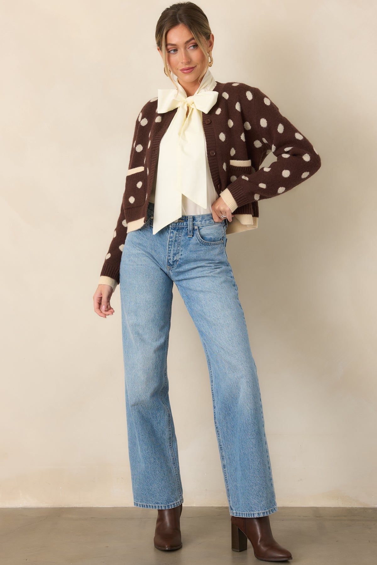 Relaxed straight-leg jeans in a light wash, designed with a high-rise waist and secure button and zip closure.
