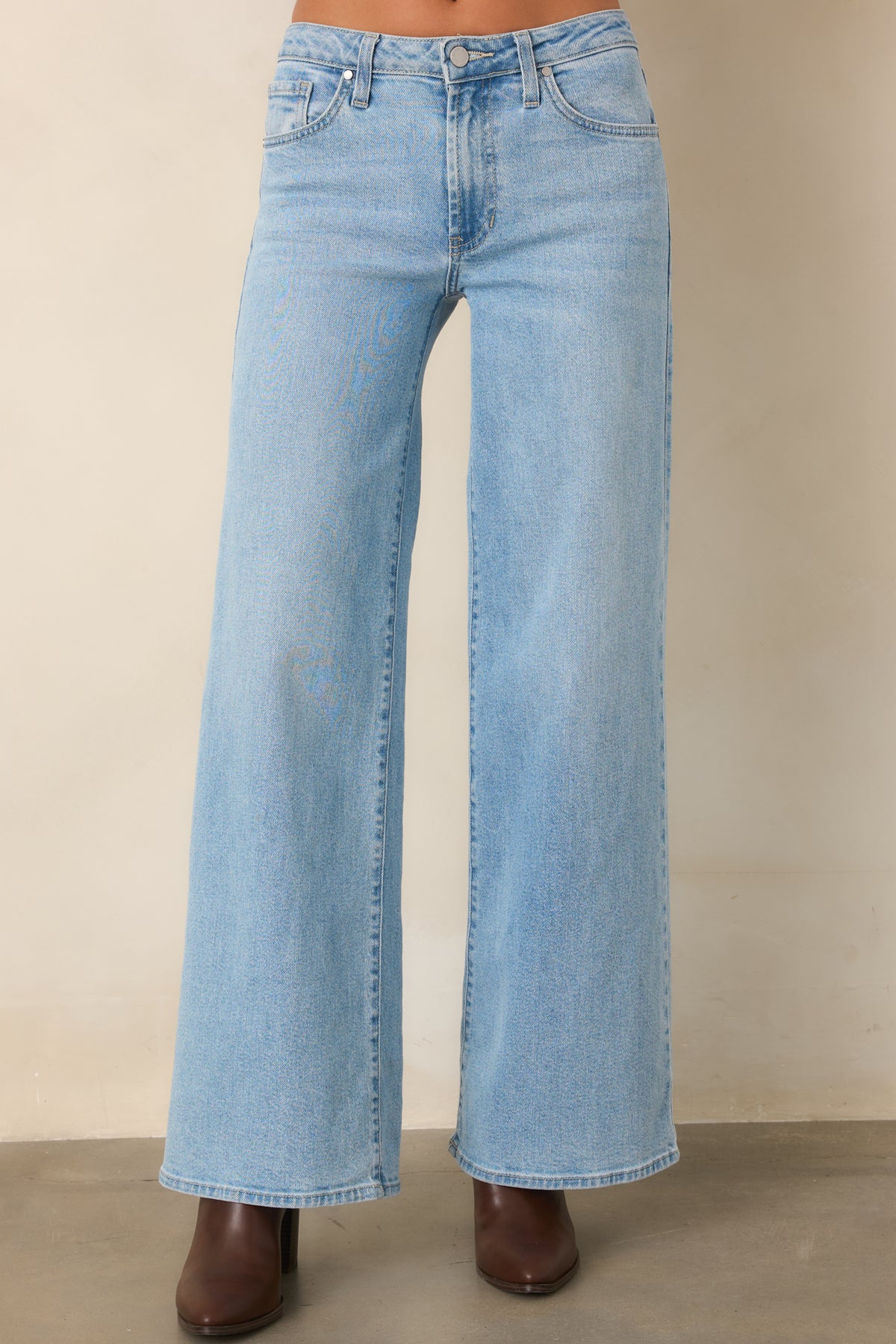 These pants showcase a clean light wash and roomy wide leg shape for an effortless look.