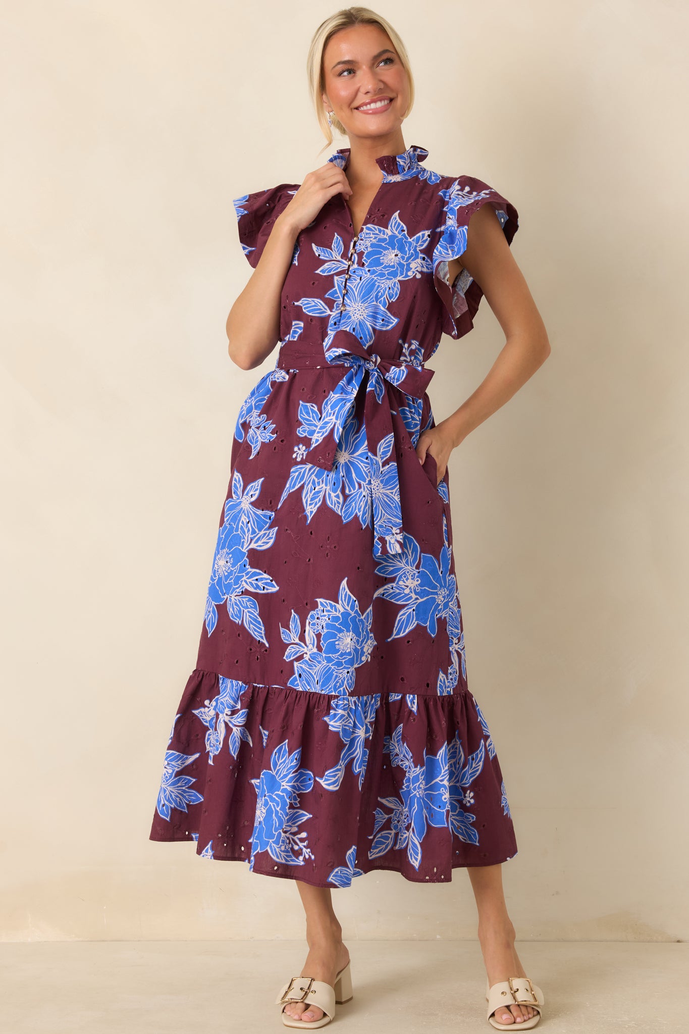 Lightweight cotton dress showcasing a relaxed silhouette, elegant gold button details, and graceful movement through the skirt.