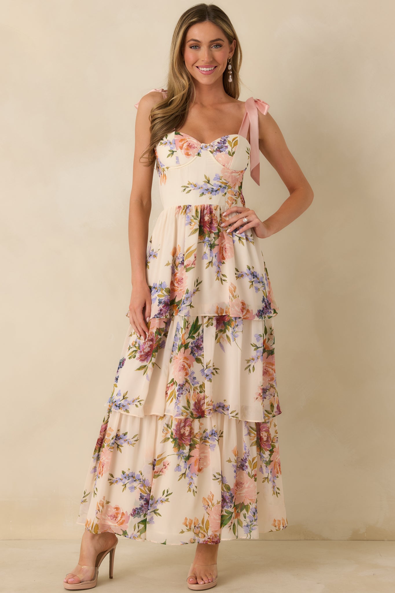 Lightweight floral chiffon dress with layered tiers and a flattering sweetheart neckline.