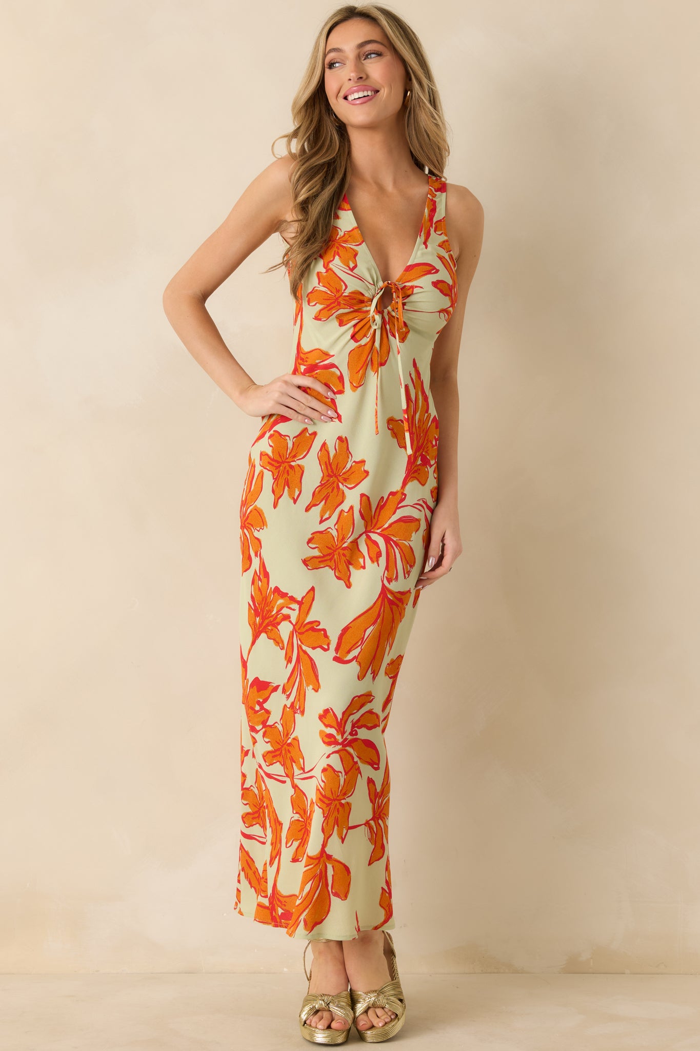 Lightweight floral maxi dress highlighting the keyhole tie-front detail.