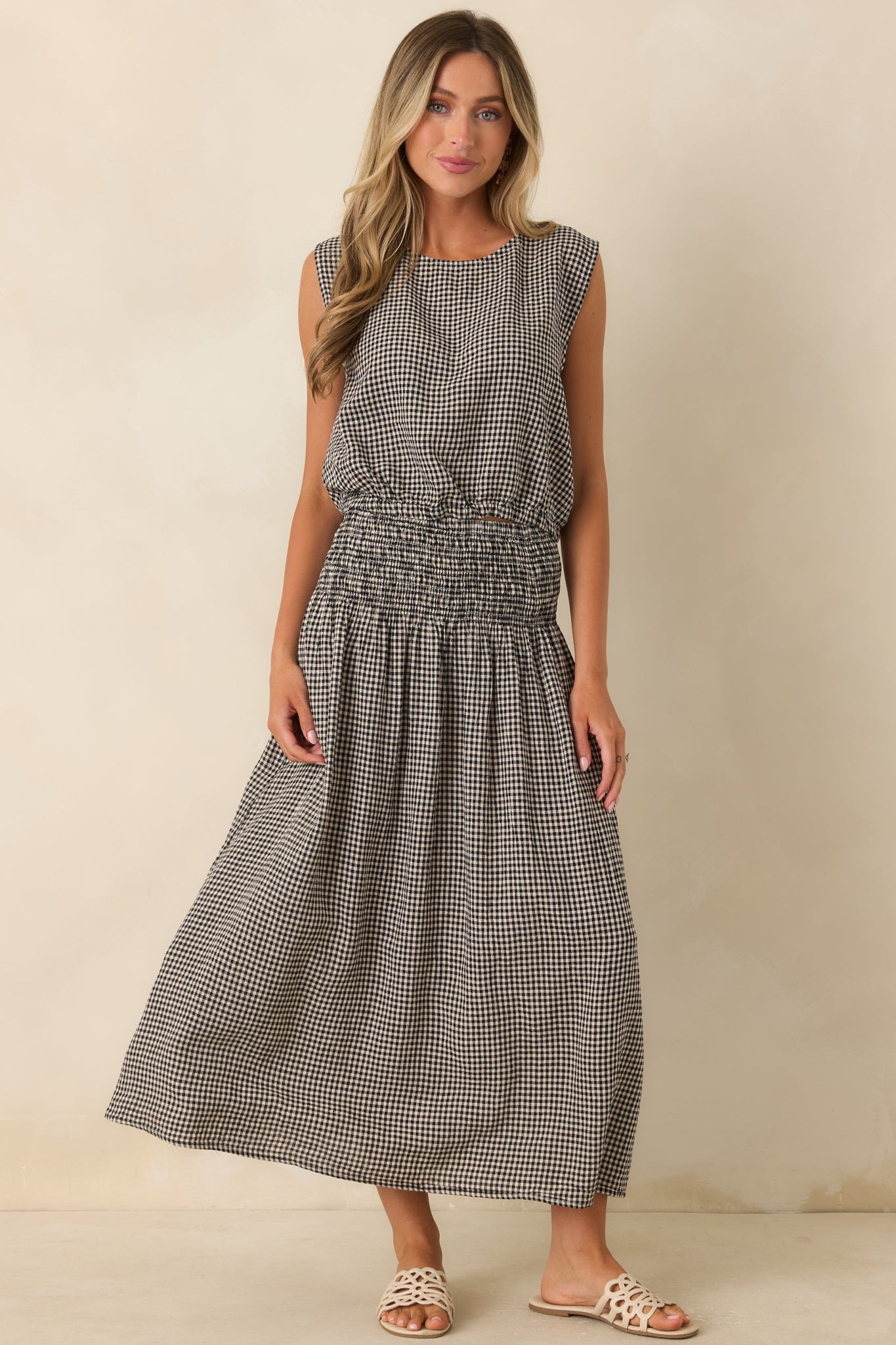 Lightweight linen blend blouse with a natural drape, polished neckline, and effortless relaxed silhouette.