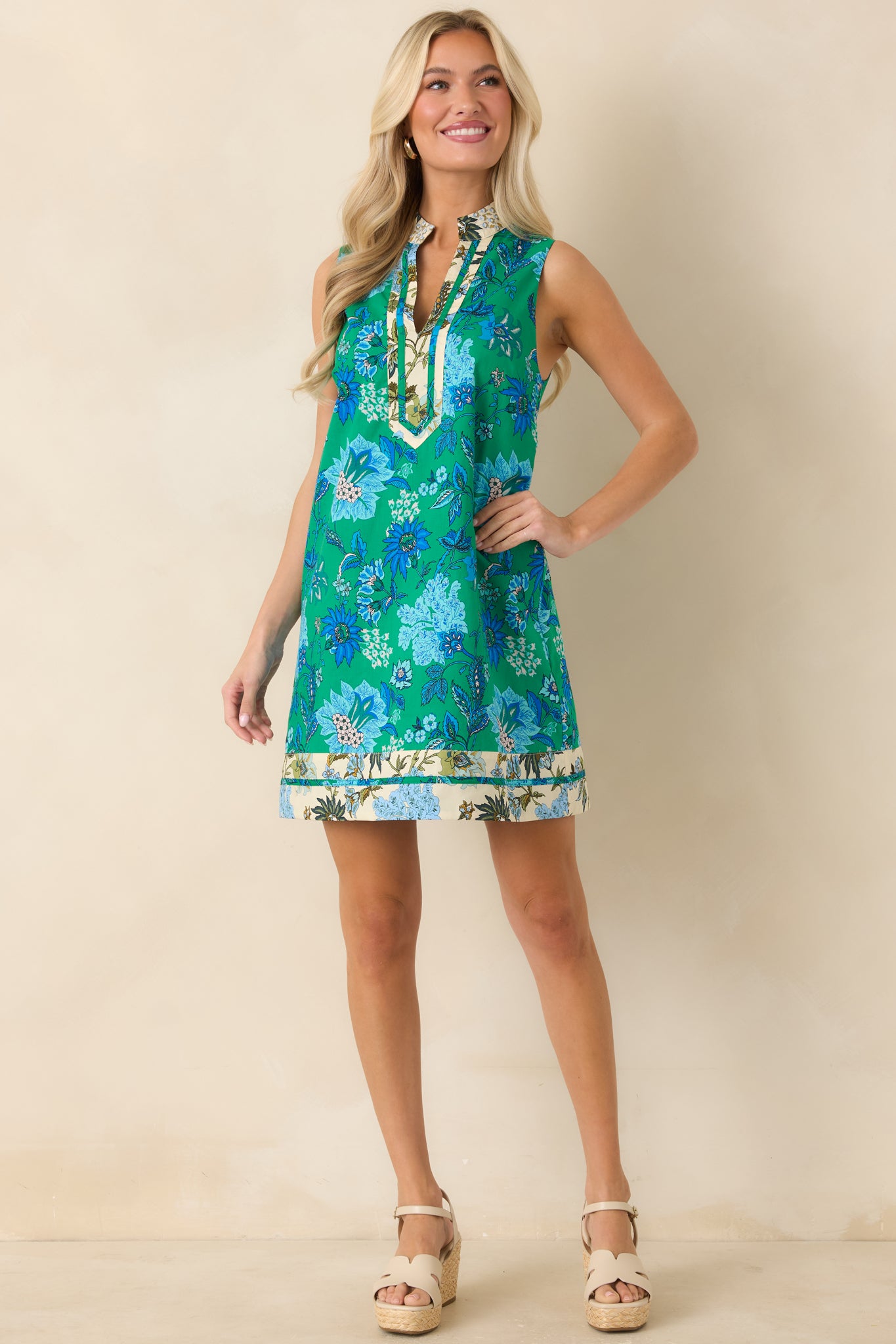 Lightweight shift dress with blue floral accents and easy, flattering fit.