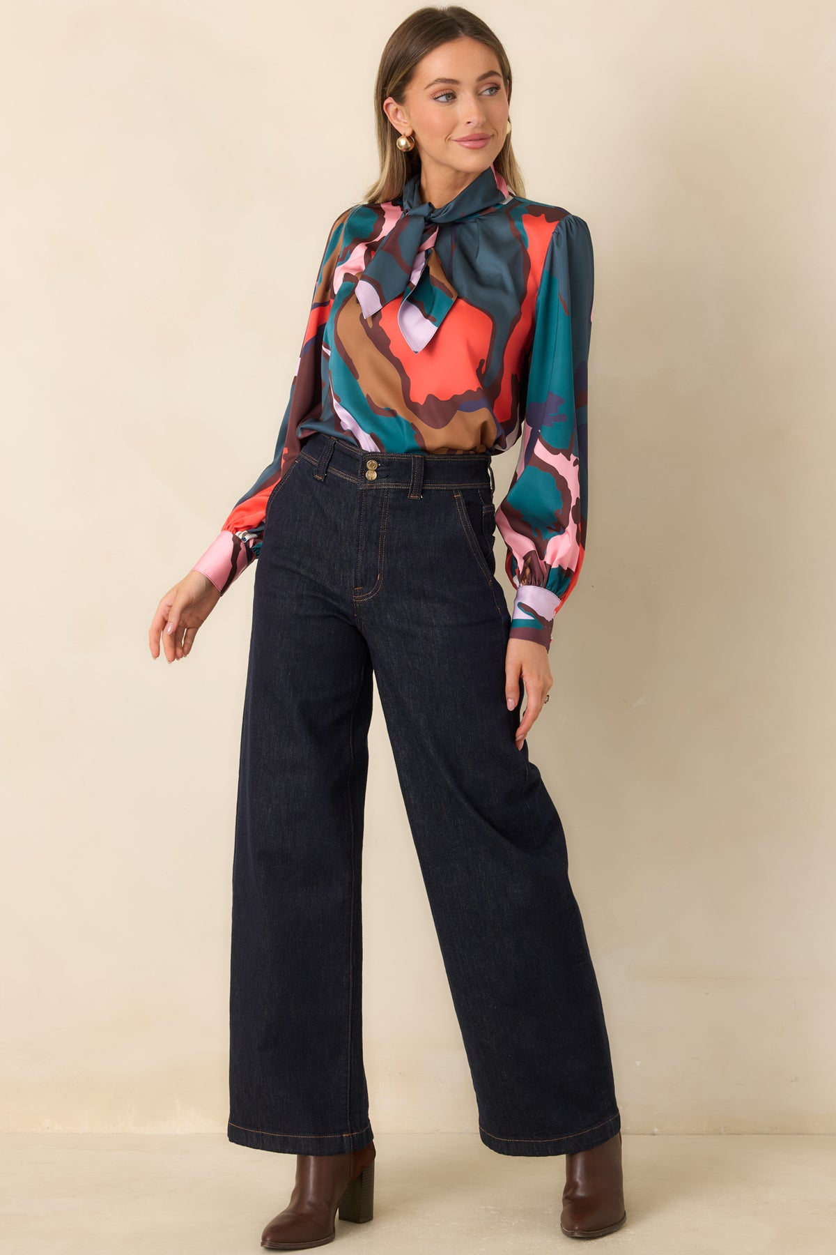 Long-sleeve printed top with a statement neck tie and buttoned cuffs.