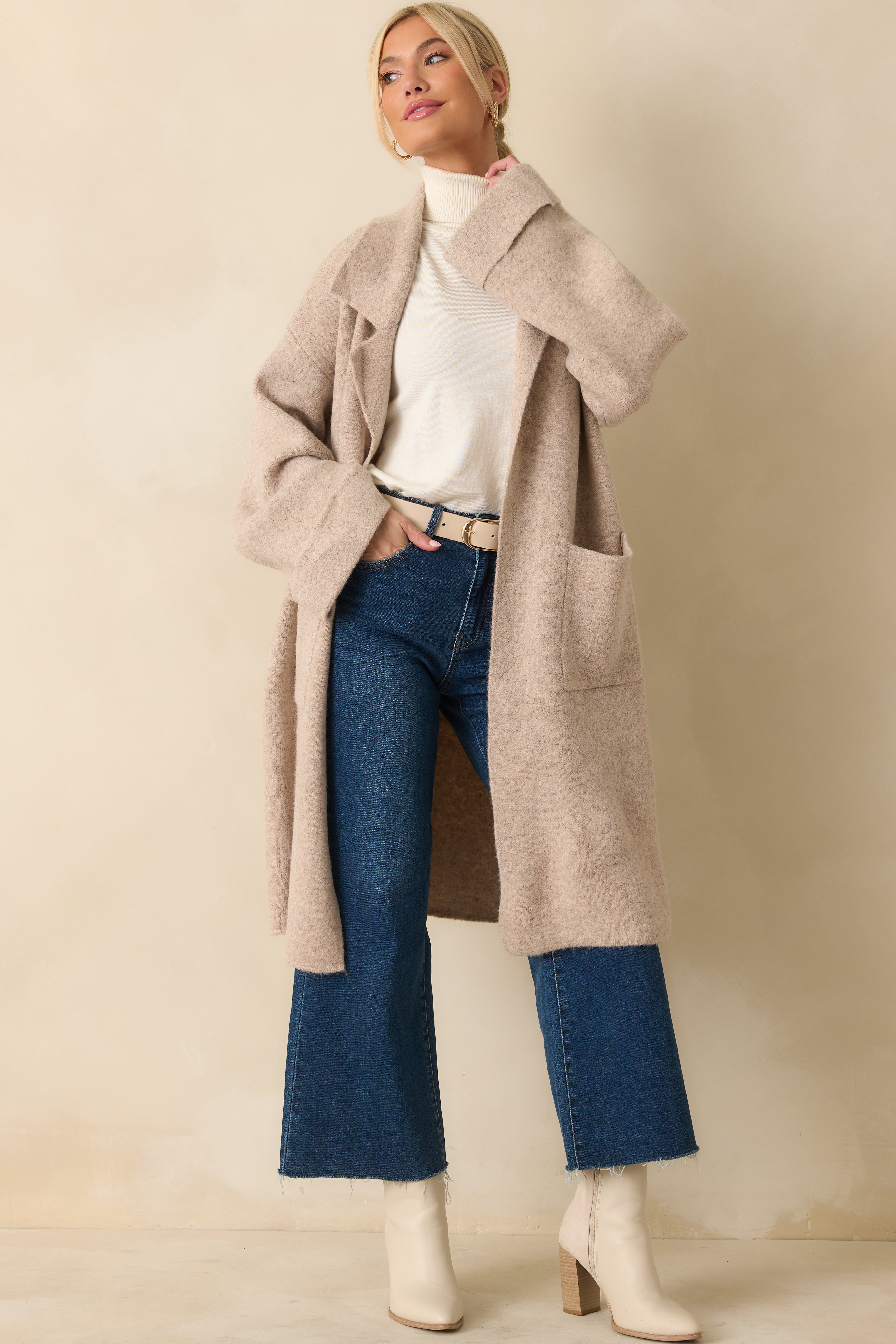 Front view of the longline cardigan highlighting its drop-shoulder sleeves and cozy, relaxed silhouette.
