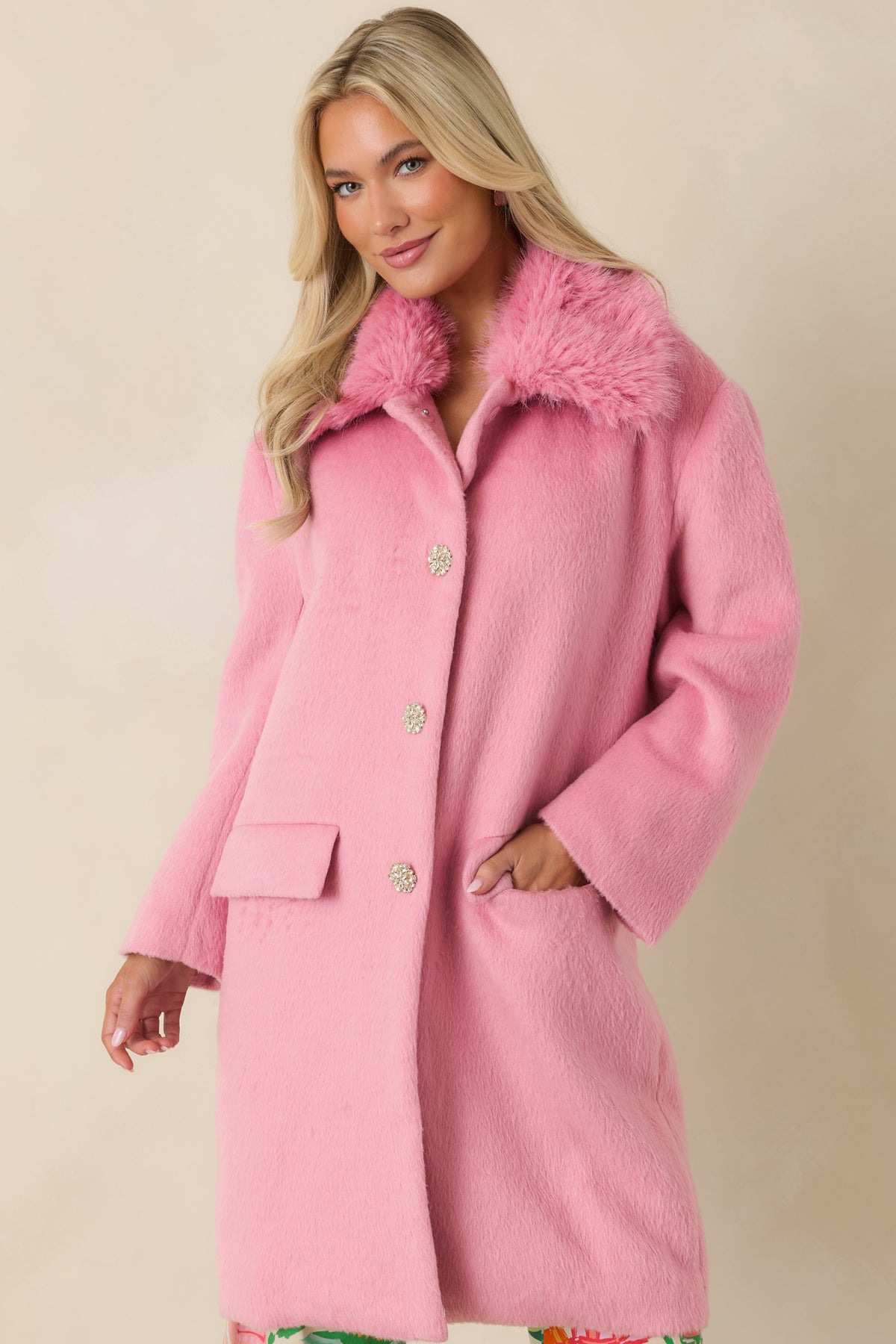 Longline wool-blend coat with a plush faux fur collar, dropped shoulders, and rhinestone buttons.