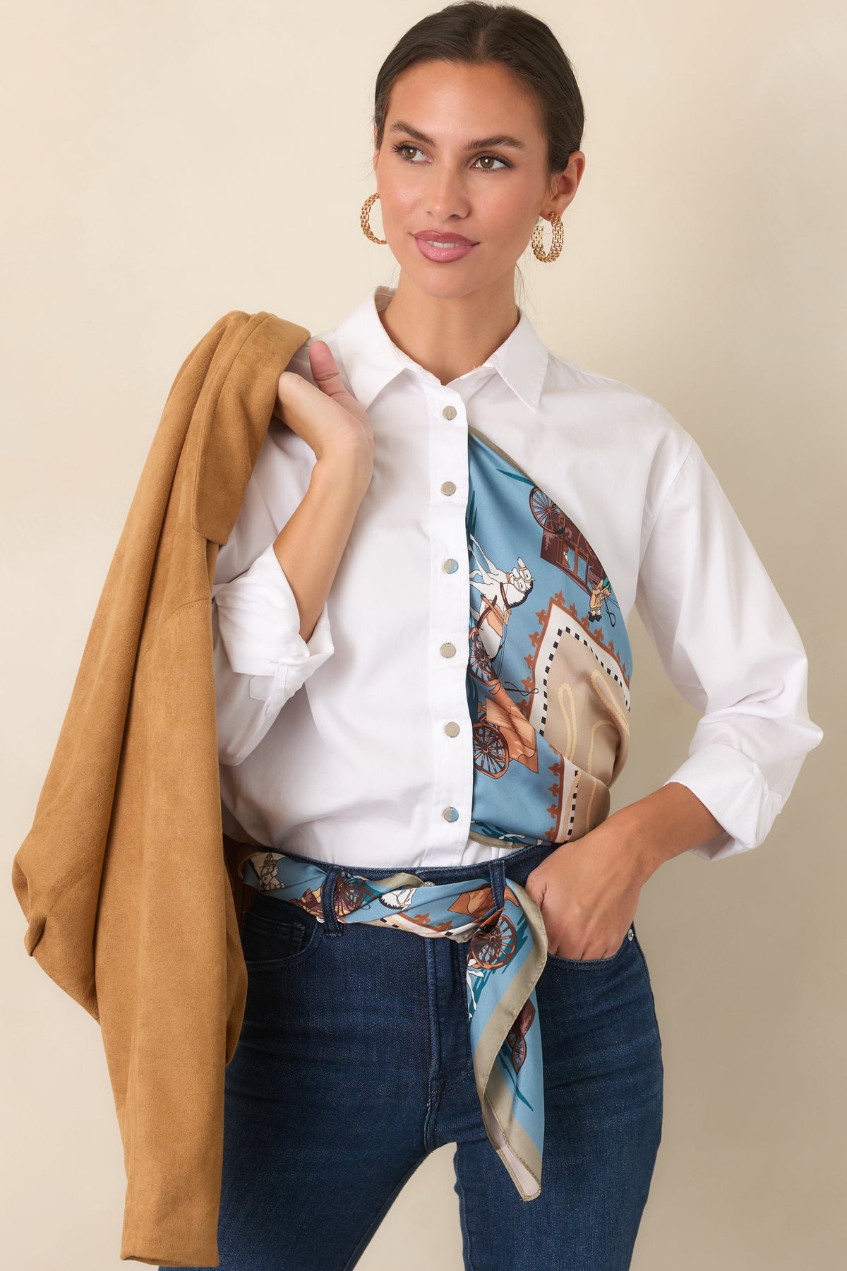 Lustrous patterned scarf featuring horse-drawn carriages surrounded by ornate motifs in a muted vintage palette.