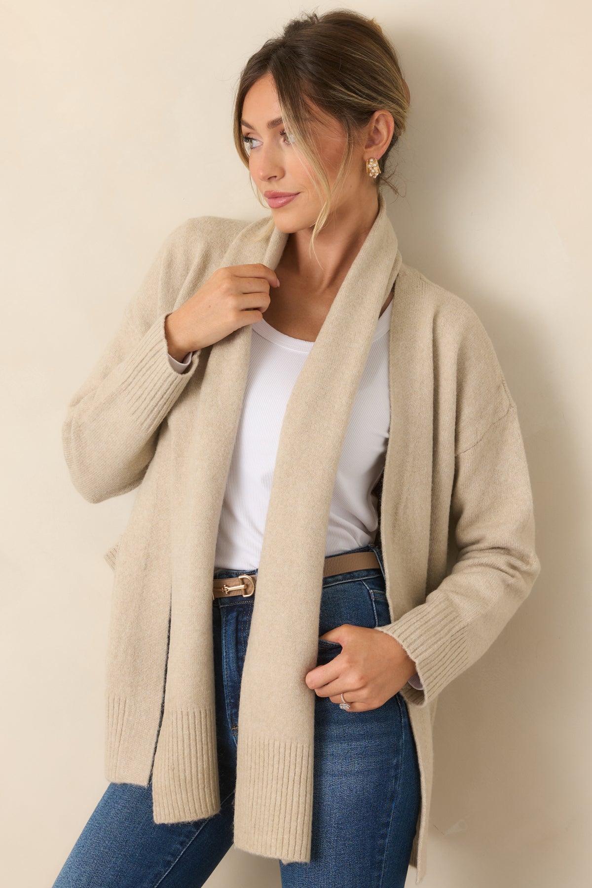 Matching scarf complements the cardigan with ribbed ends and a soft coordinated finish.