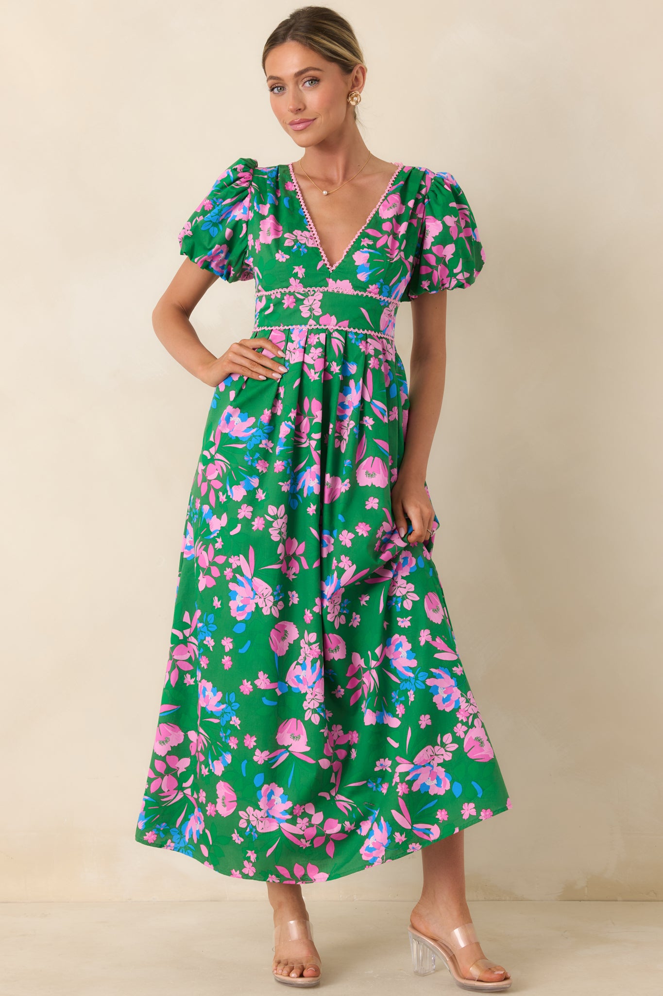 Maxi dress with a relaxed bodice and flowing skirt that creates soft movement.