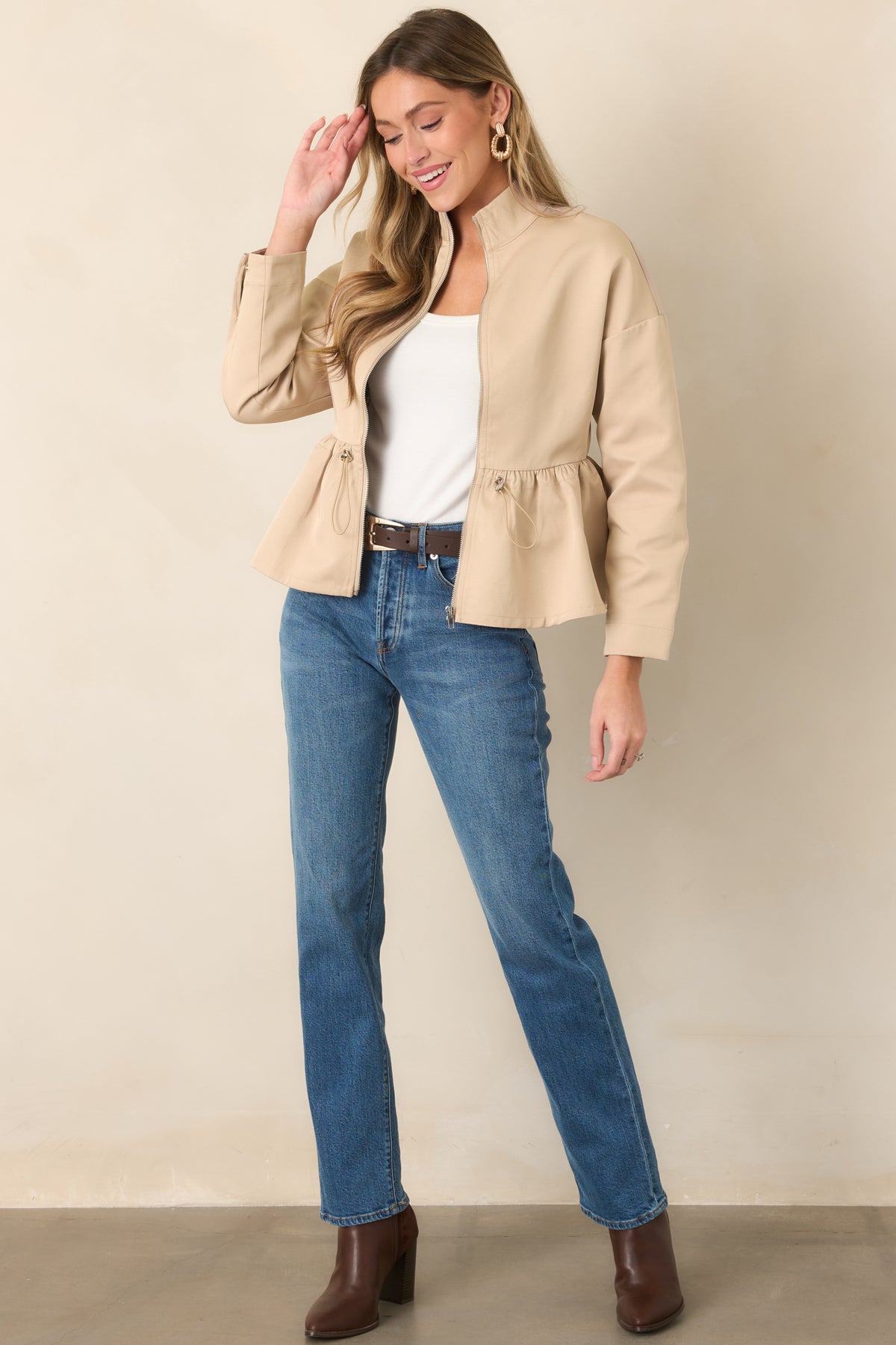 Medium wash straight-leg jeans with a soft stretch finish and classic shape.