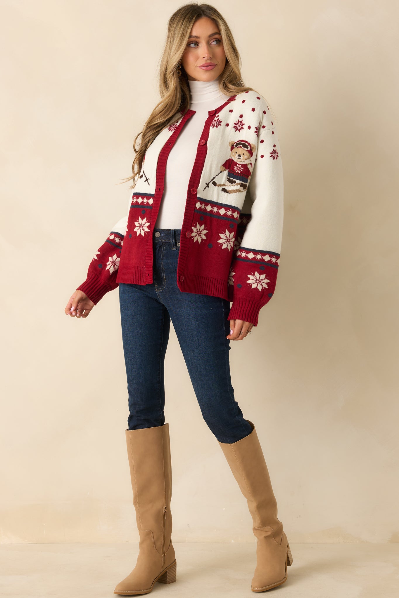 Mid-weight acrylic-blend cardigan with seasonal motifs and a comfortable, roomy shape for casual wear.