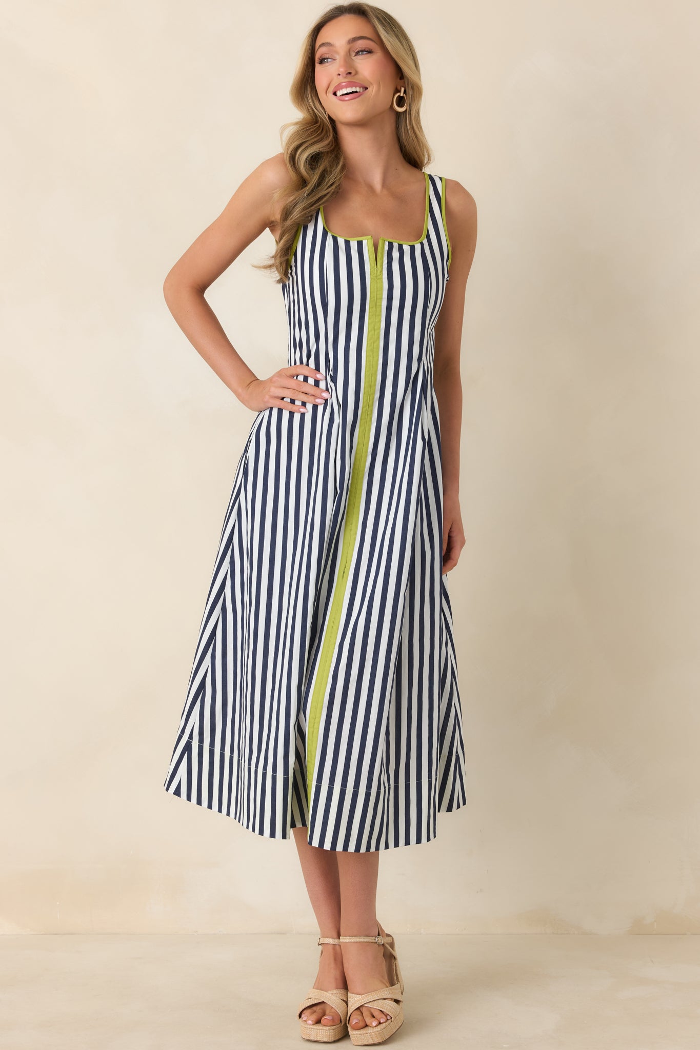 Front-facing angle of the midi dress highlighting breathable cotton fabric, structured bodice, and flowing skirt.