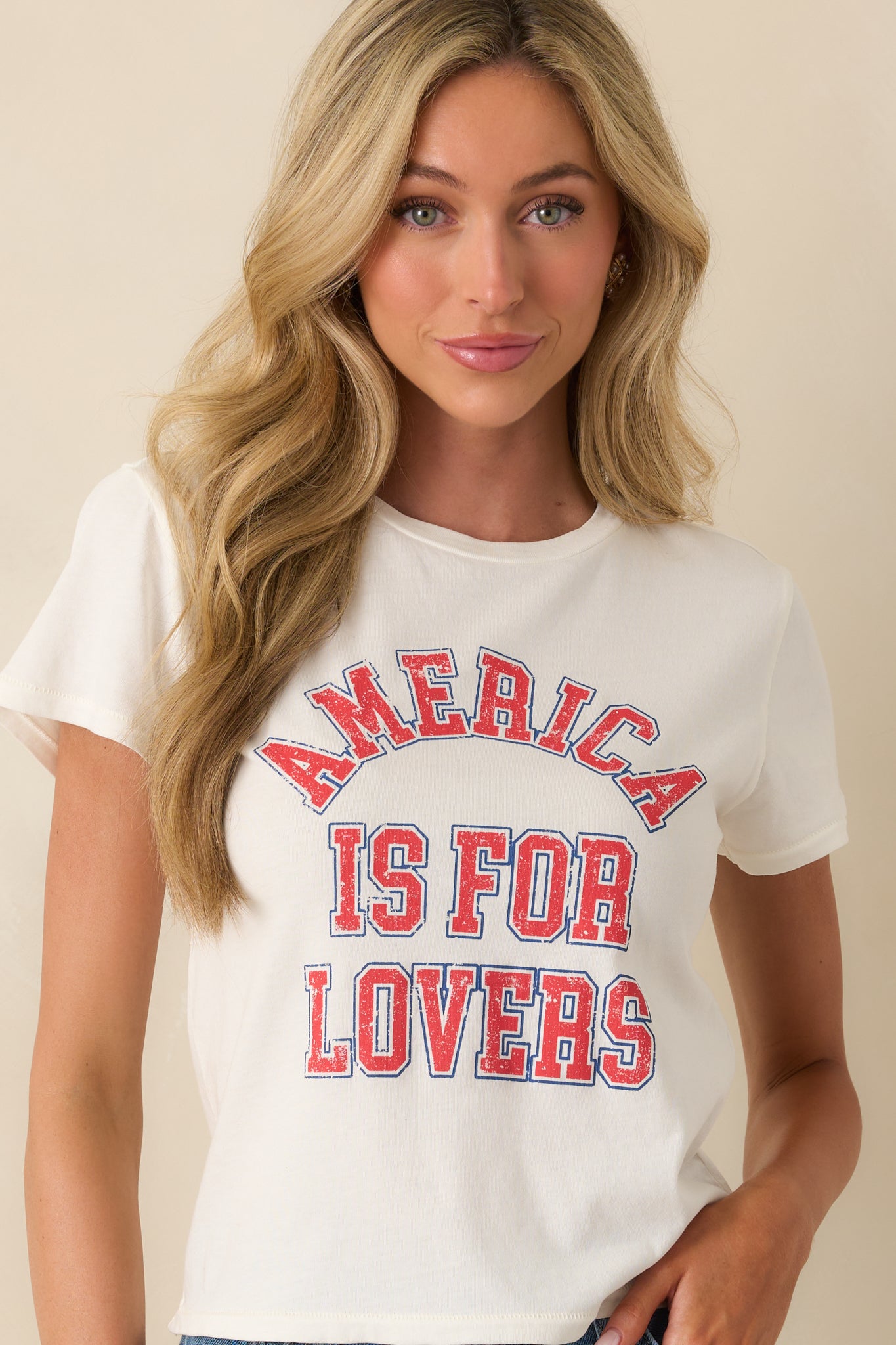 Midsection crop showing the lower portion of the printed text and the relaxed hemline.