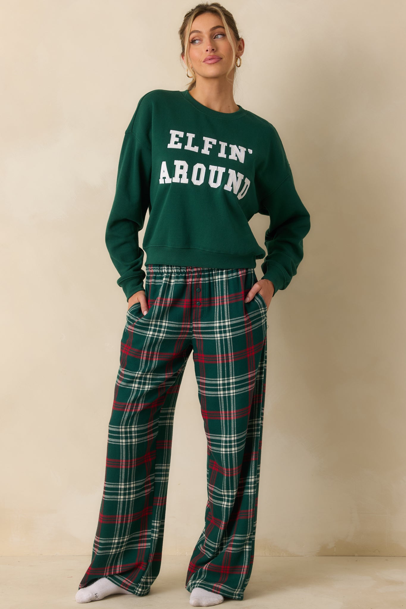 Mistletoe green oversized sweatshirt with a crew neckline, long sleeves, and relaxed fit featuring a twill “Elfin’ Around” applique.