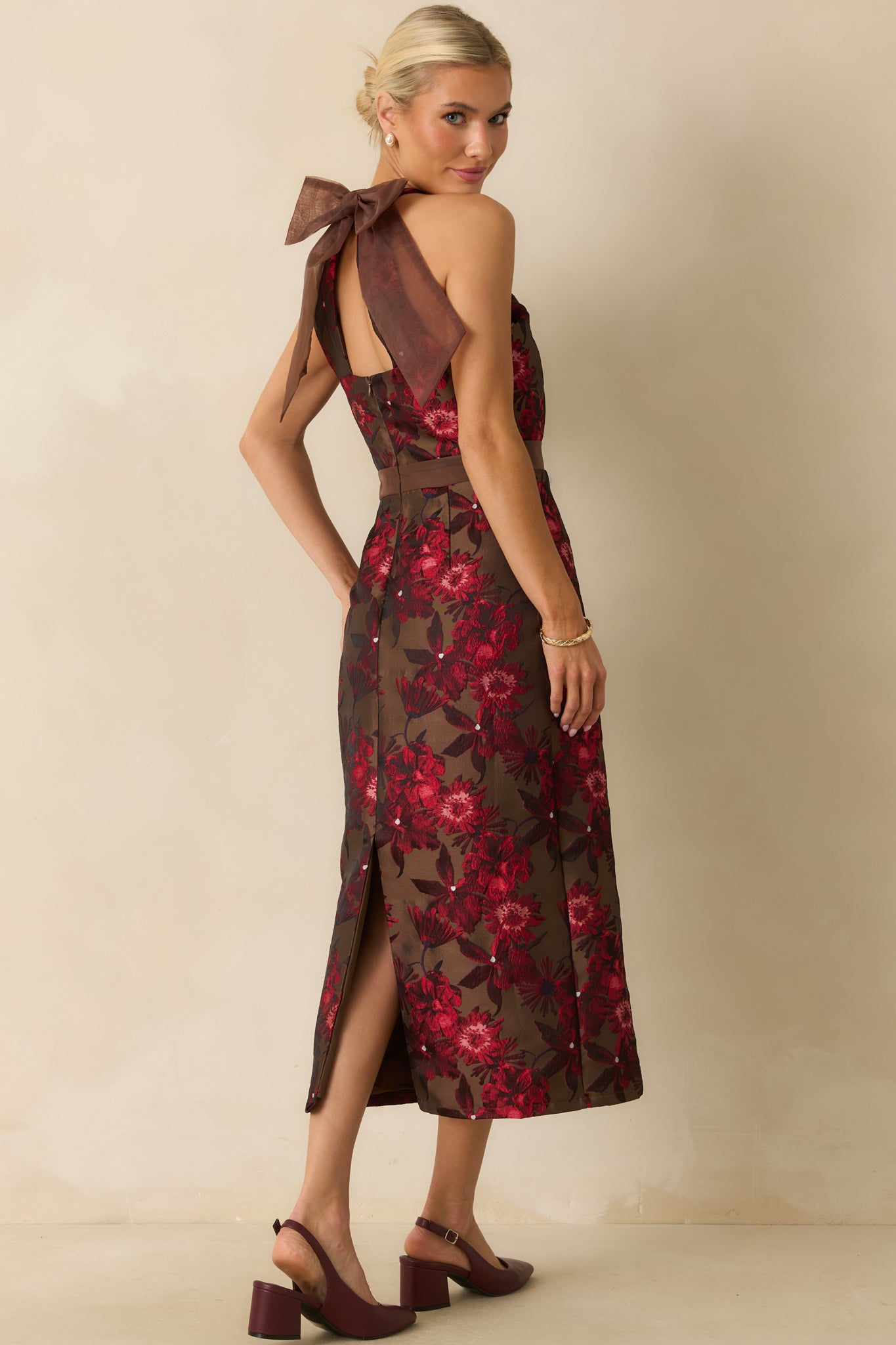 Mocha brown floral jacquard midi dress featuring a halter neckline and fitted bodice with a defined waistband.
