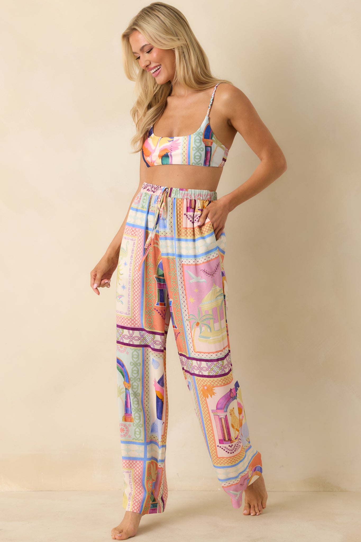 Multi-colored bikini top highlighting scoop neckline and fully lined supportive design.