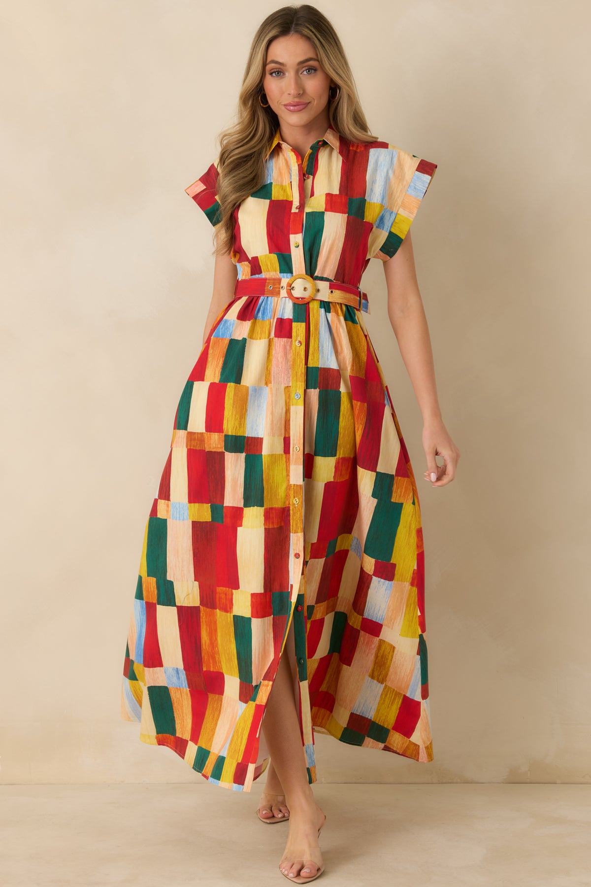 Cotton maxi shirt dress with a colorful brushstroke block print, structured collar, extended cap sleeves, and buttoned skirt.