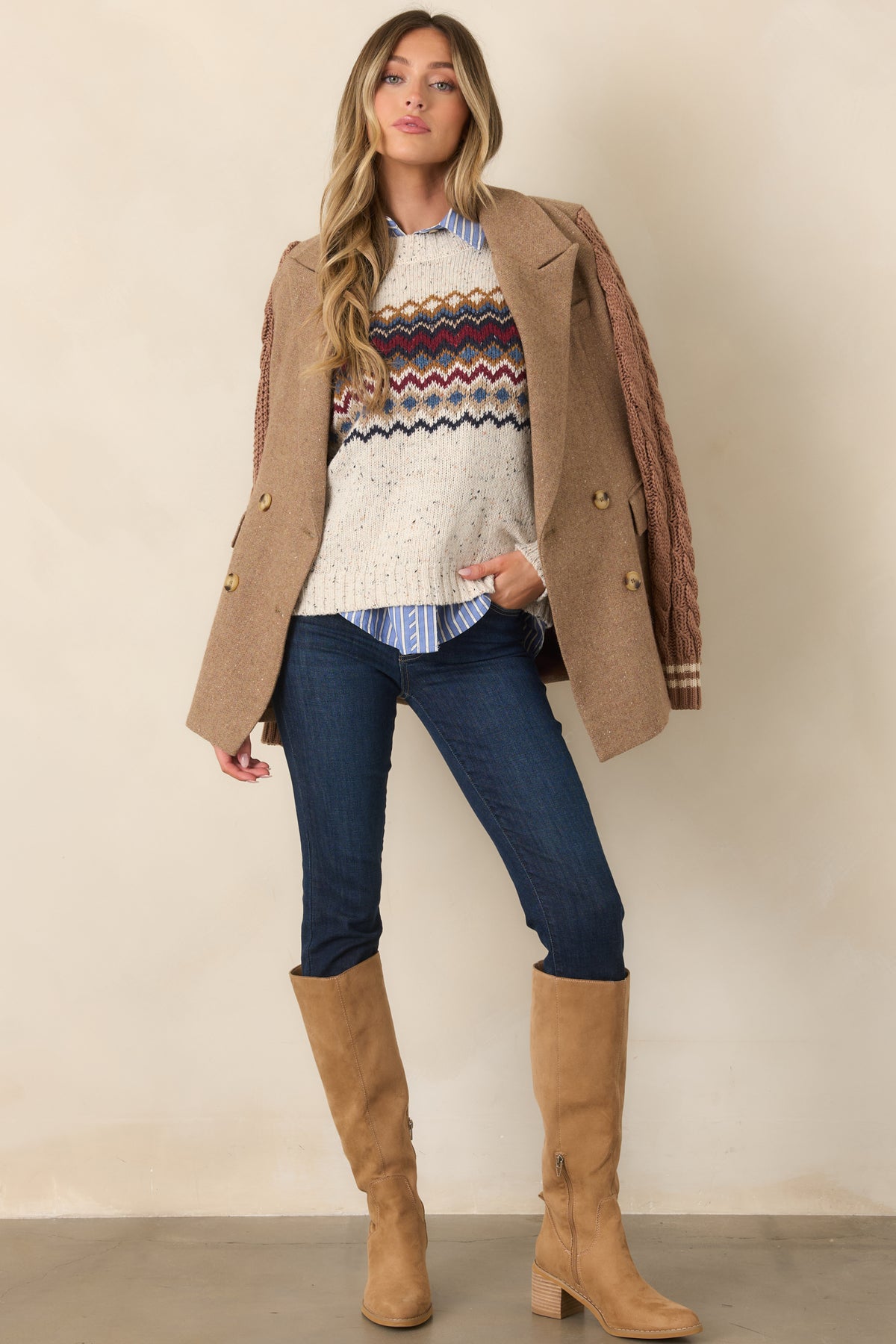 Natural-hued flecked knit top with burgundy, navy, dusty blue, and camel patterning across the chest and long sleeves.