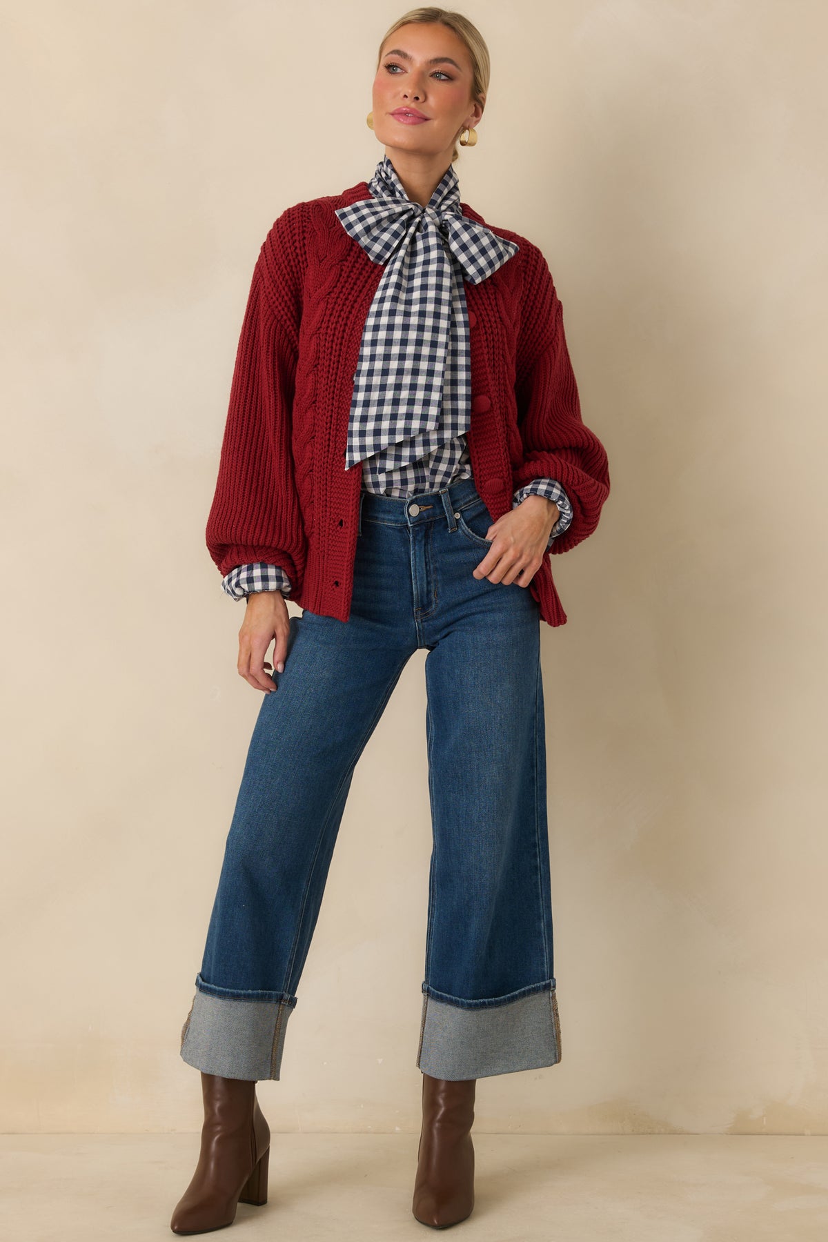 Structured cotton-blend blouse featuring a concealed front button placket and long sleeves with buttoned cuffs.