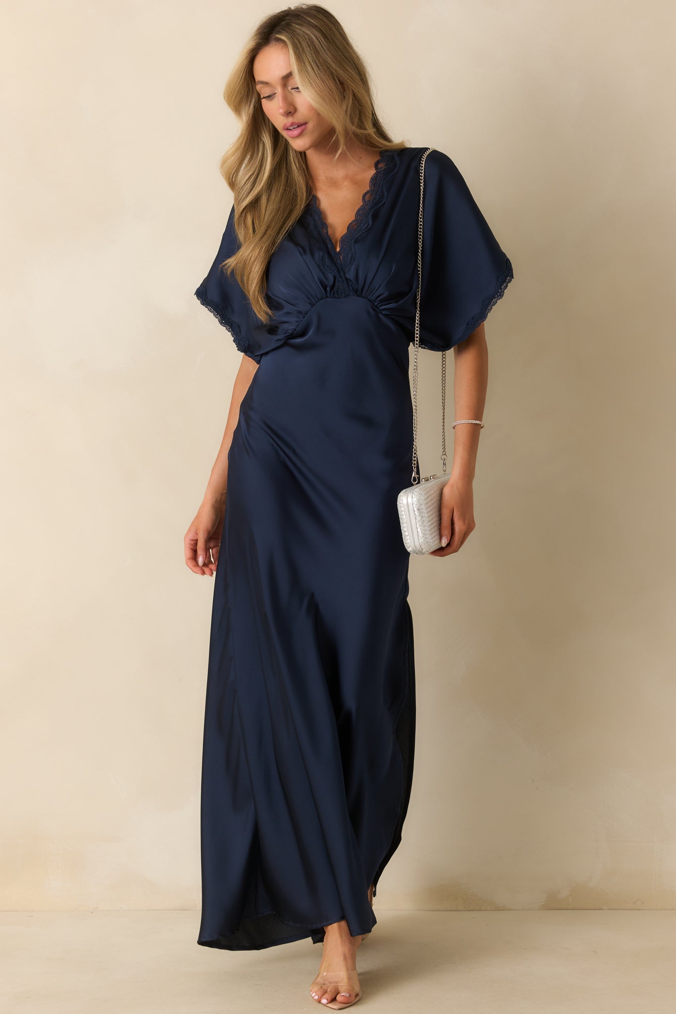 Navy satin maxi dress with a v-neckline and short kimono sleeves.