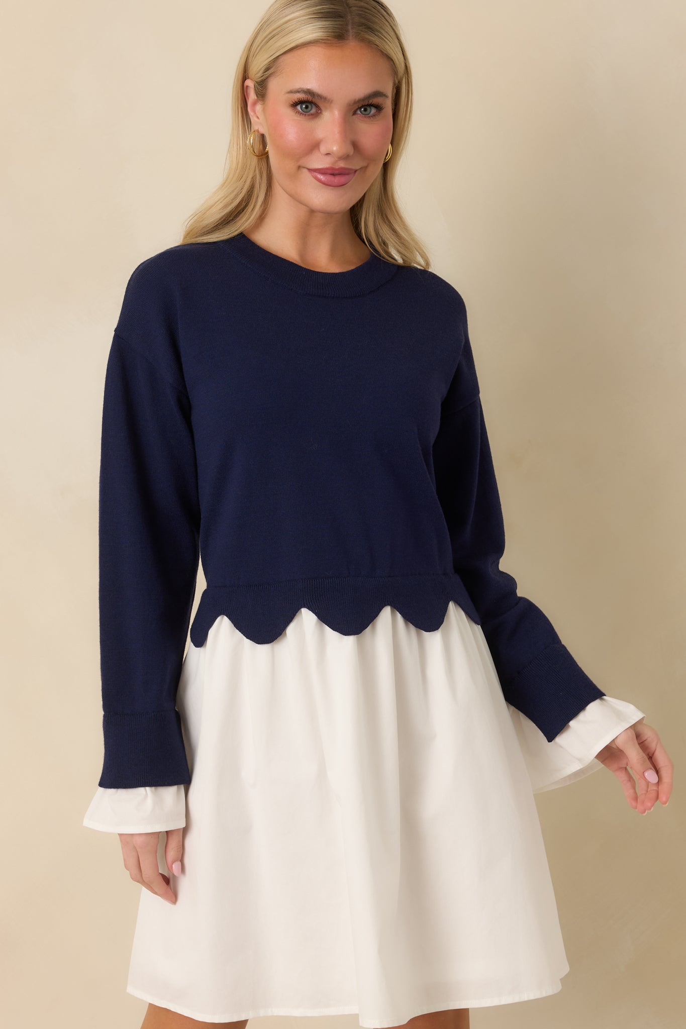Navy and white mini dress highlighting the transition from the knit bodice to the lightweight woven skirt.