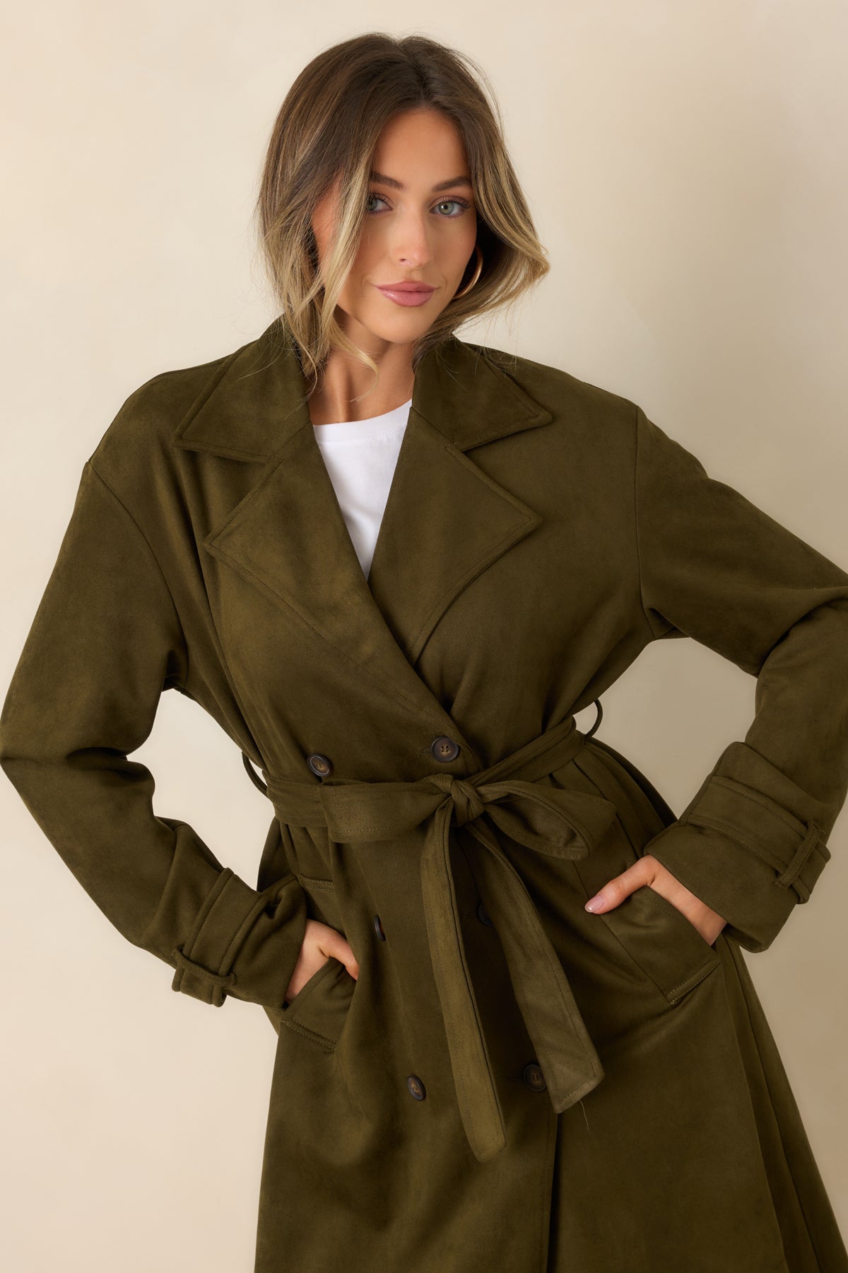Notched collar and double-breasted button front on the tailored longline coat.