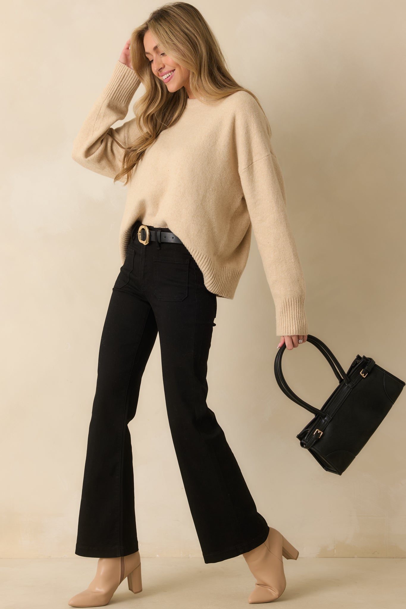 Full body side view highlighting the straight hem and soft knit fabric.