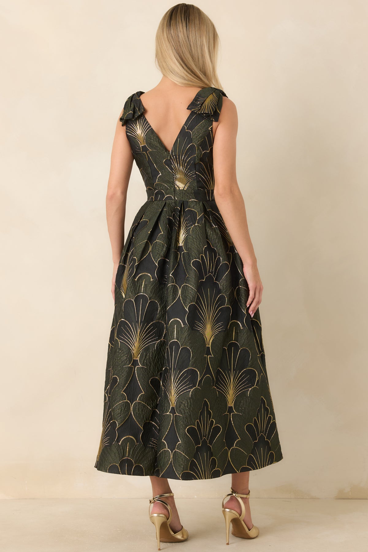 Back of the olive floral jacquard midi dress featuring a V-shaped neckline and delicate ruffle shoulder straps.
