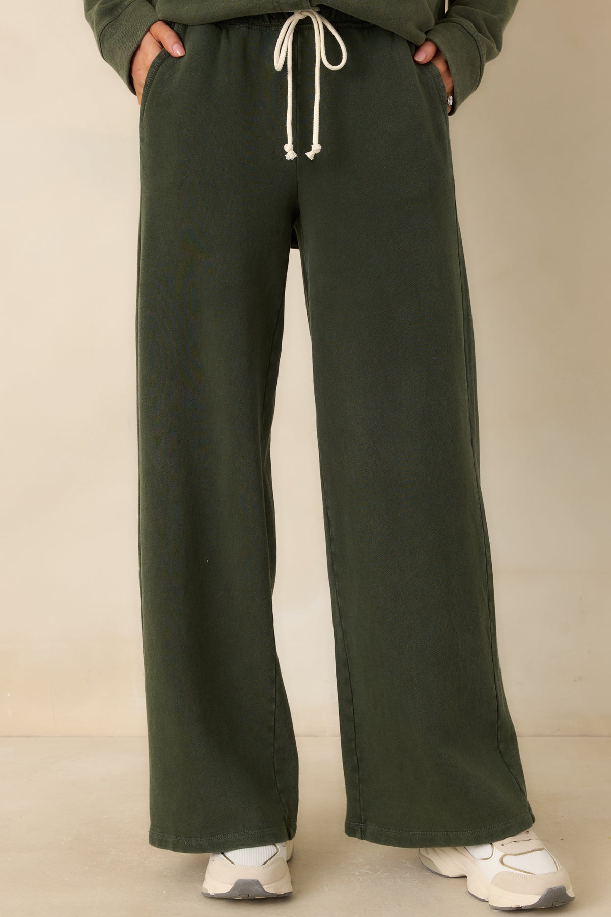 Soft washed cotton-blend fabric gives these olive green pants a casual, textured finish.